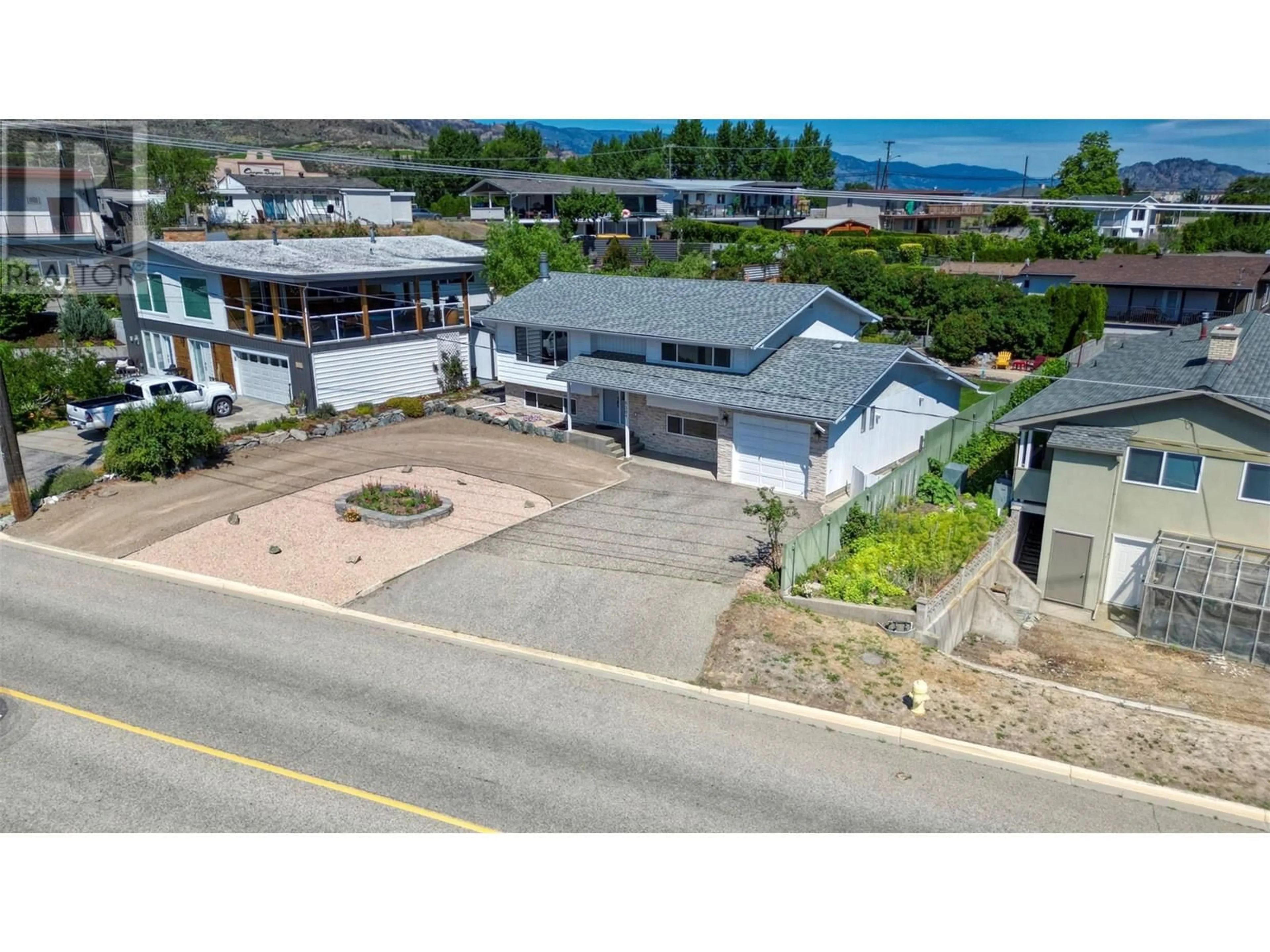 A pic from outside/outdoor area/front of a property/back of a property/a pic from drone, unknown for 9504 62ND AVENUE, Osoyoos British Columbia V0H1V1