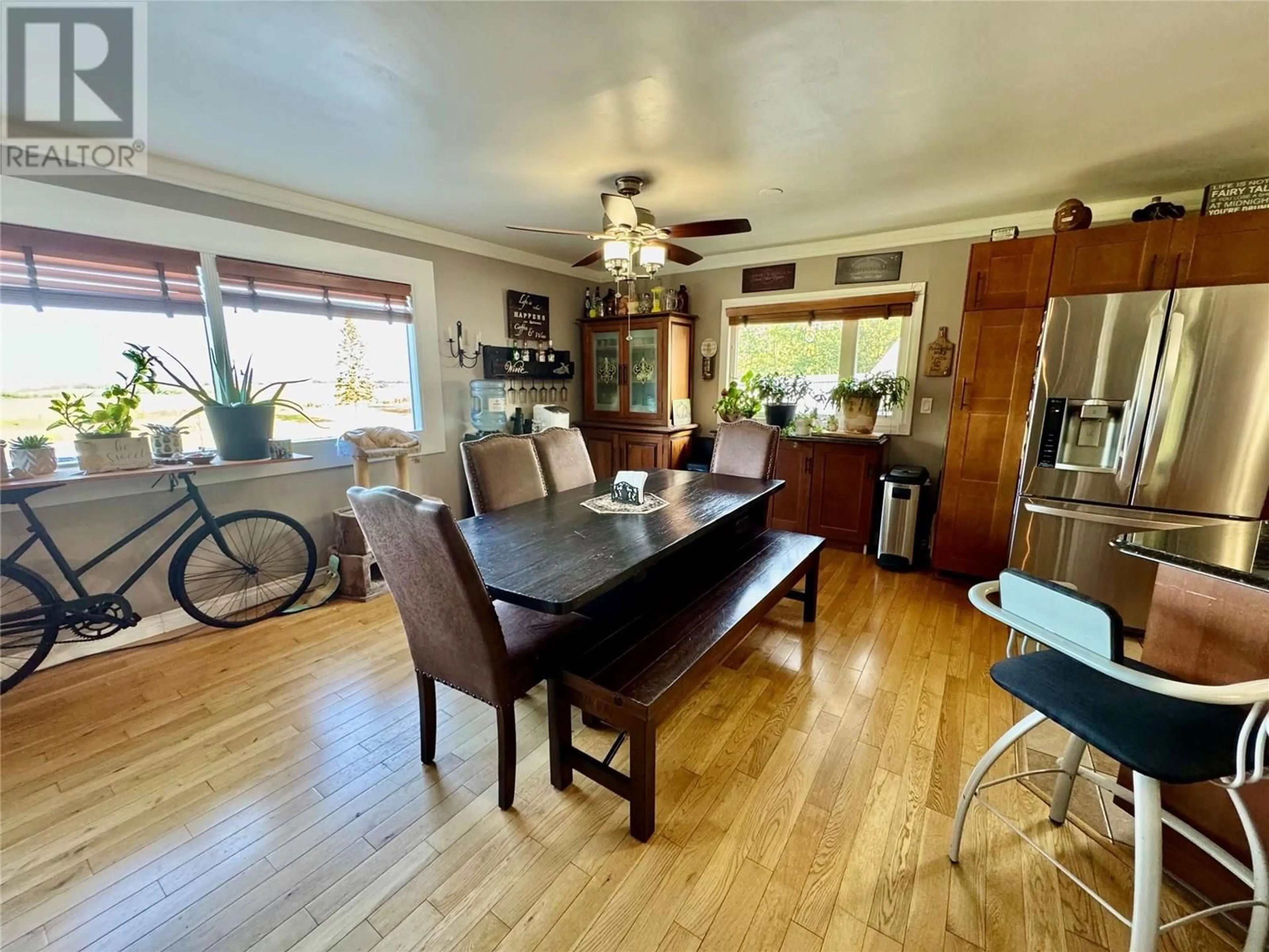 Dining room, wood/laminate floor for 8839 227 ROAD, Dawson Creek British Columbia V1G5A1