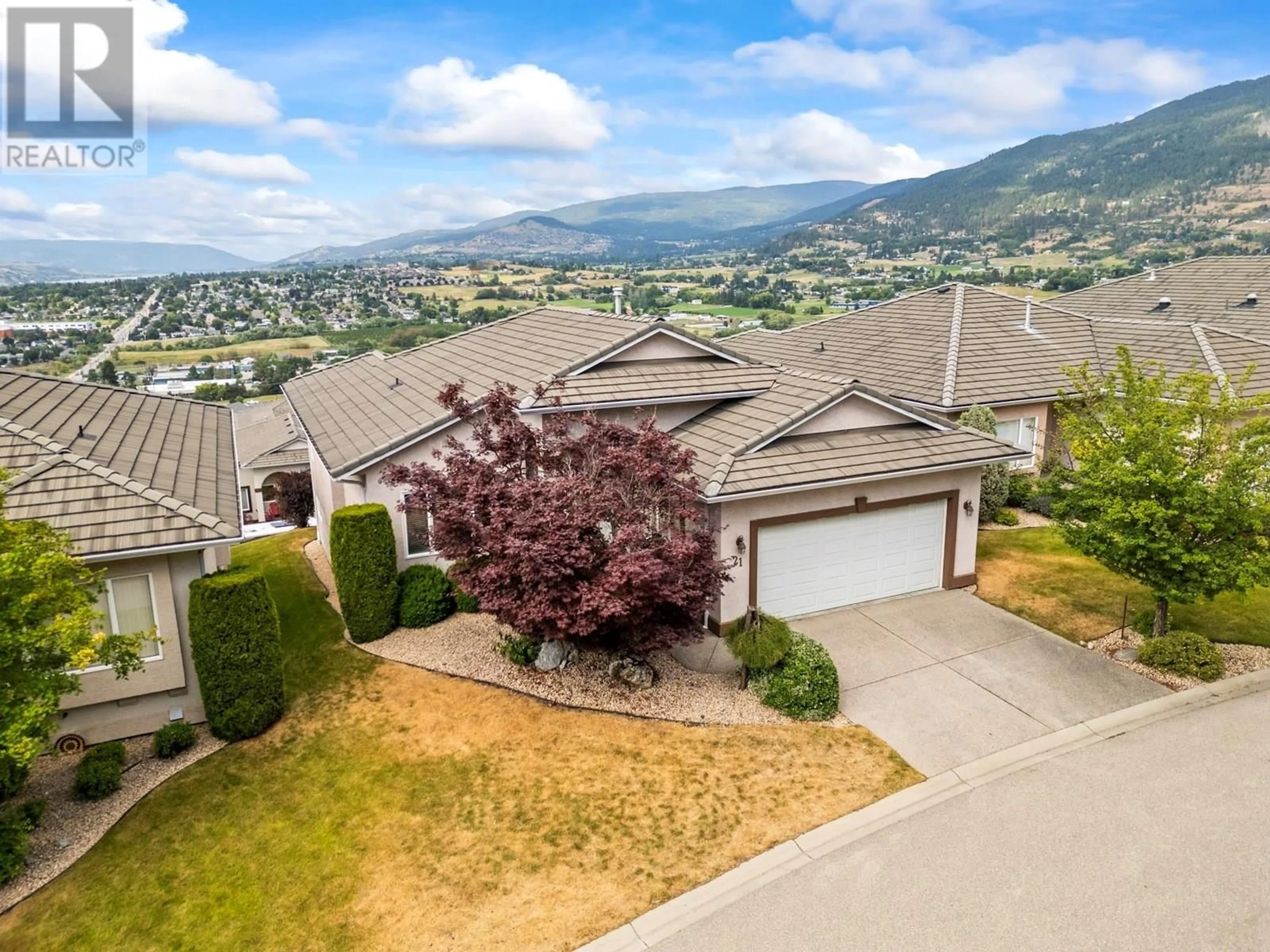 A pic from outside/outdoor area/front of a property/back of a property/a pic from drone, mountain view for 21 QUAIL VISTA PLACE, Vernon British Columbia V1B3X9