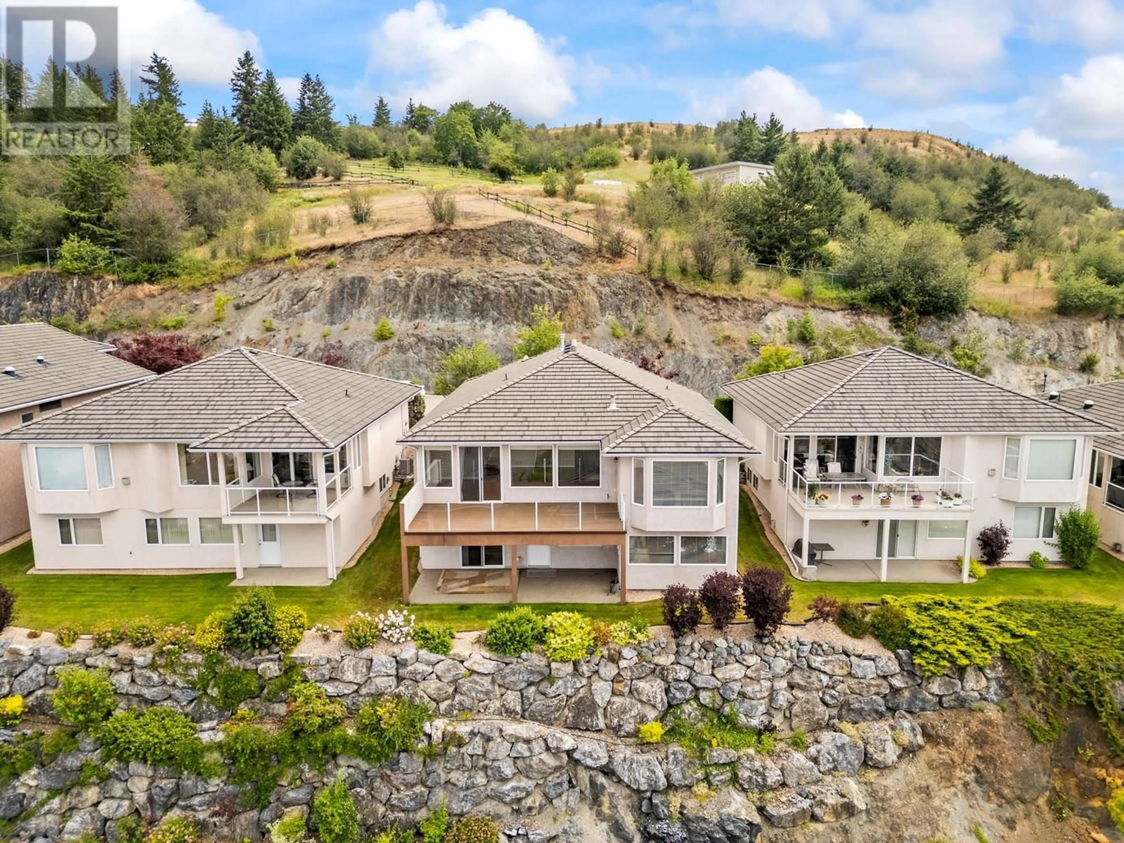 A pic from outside/outdoor area/front of a property/back of a property/a pic from drone, mountain view for 21 QUAIL VISTA PLACE, Vernon British Columbia V1B3X9