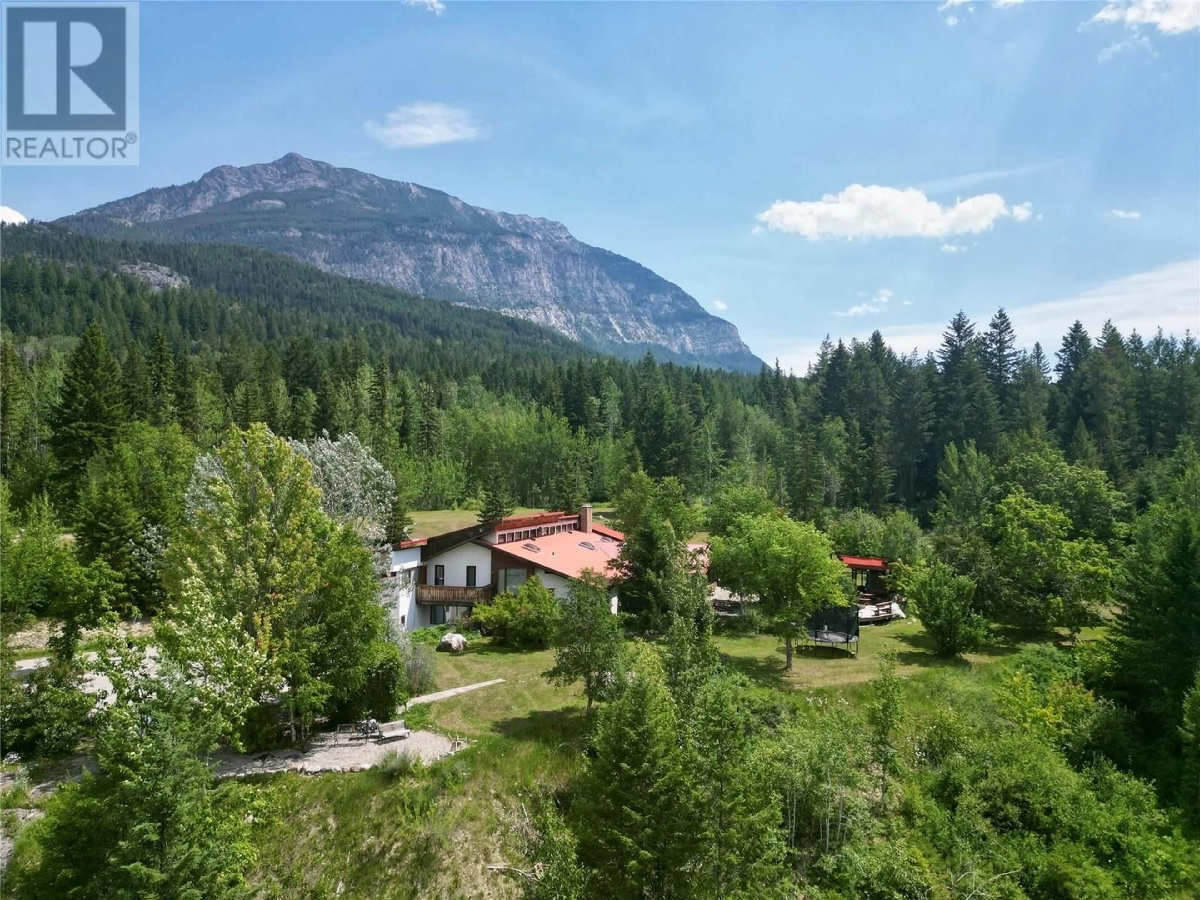 A pic from outside/outdoor area/front of a property/back of a property/a pic from drone, mountain view for 1297 CAMPBELL ROAD, Golden British Columbia V0A1H7