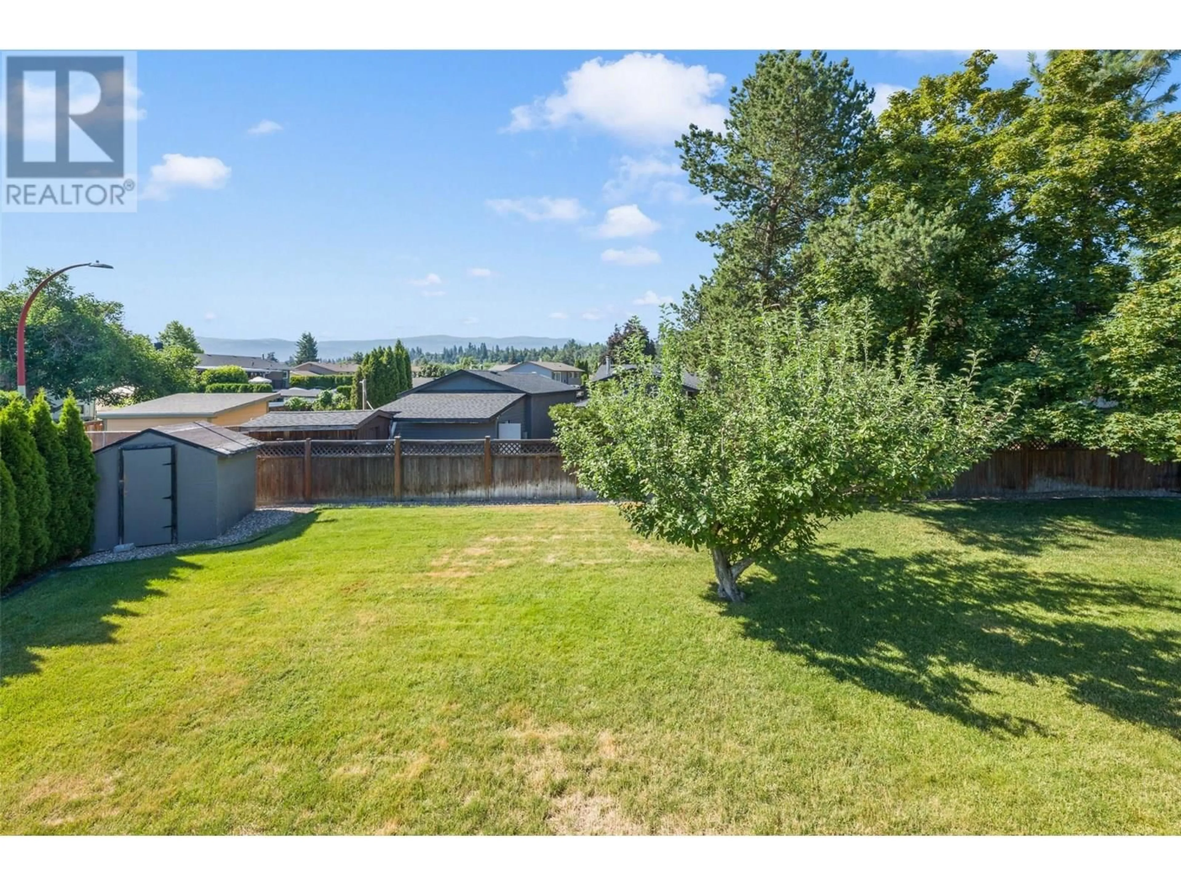 A pic from outside/outdoor area/front of a property/back of a property/a pic from drone, water/lake/river/ocean view for 1415 RENFREW ROAD, Kelowna British Columbia V1X5W9