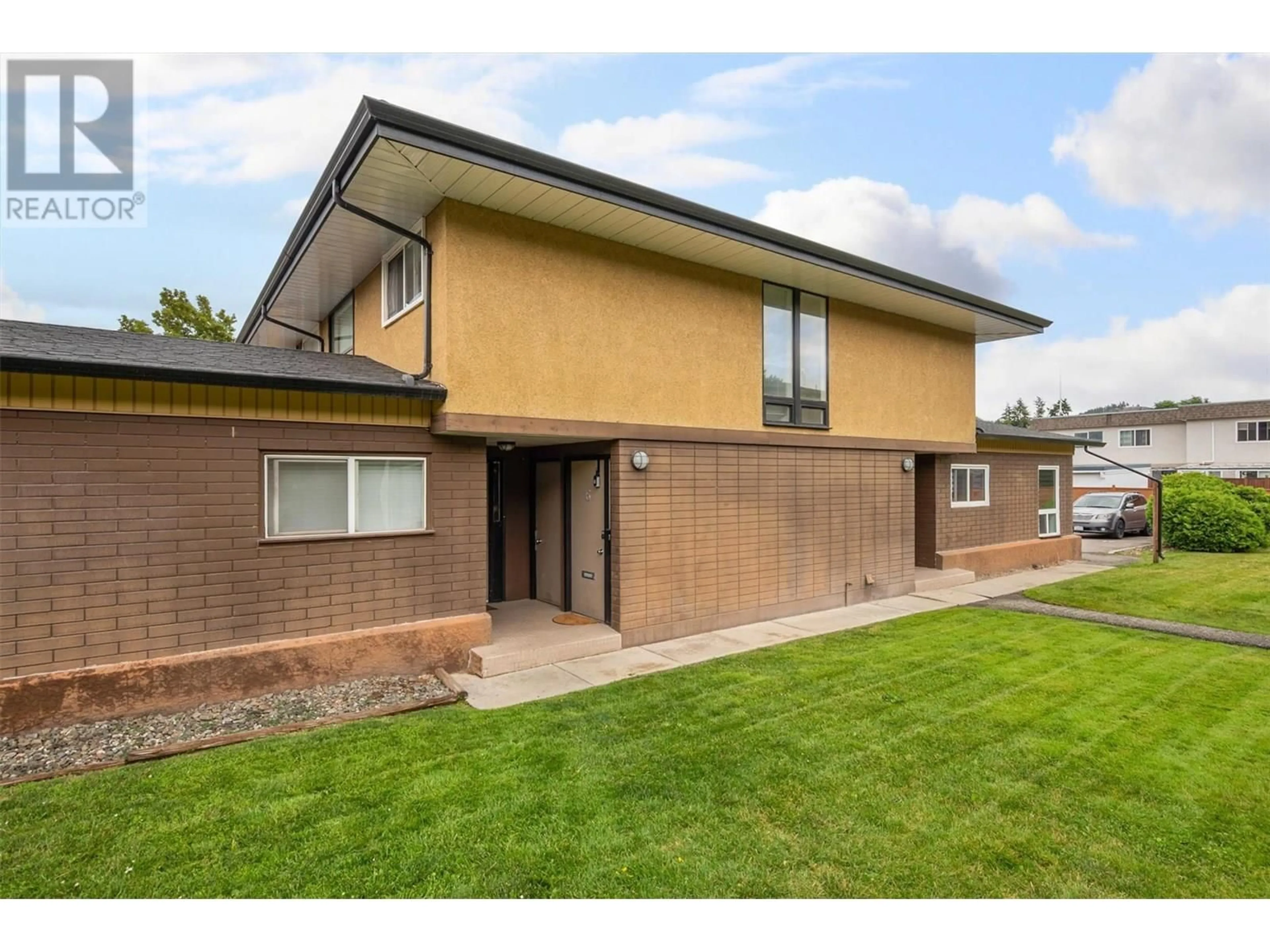 Home with brick exterior material, building for 6 - 1291 BERNARD AVENUE, Kelowna British Columbia V1Y8K5