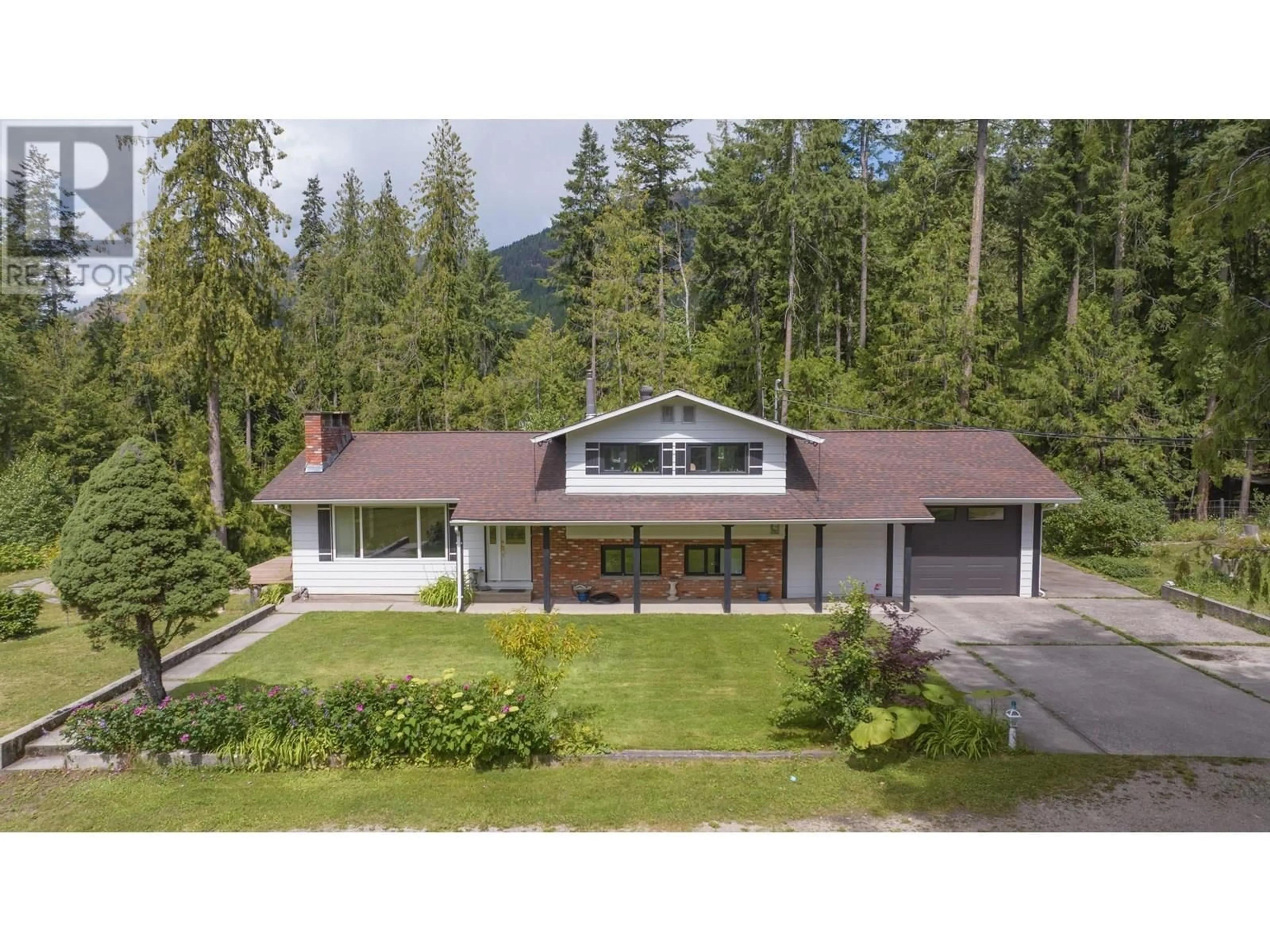 A pic from outside/outdoor area/front of a property/back of a property/a pic from drone, mountain view for 40 ROSOMAN ROAD, Enderby British Columbia V4Y4K4