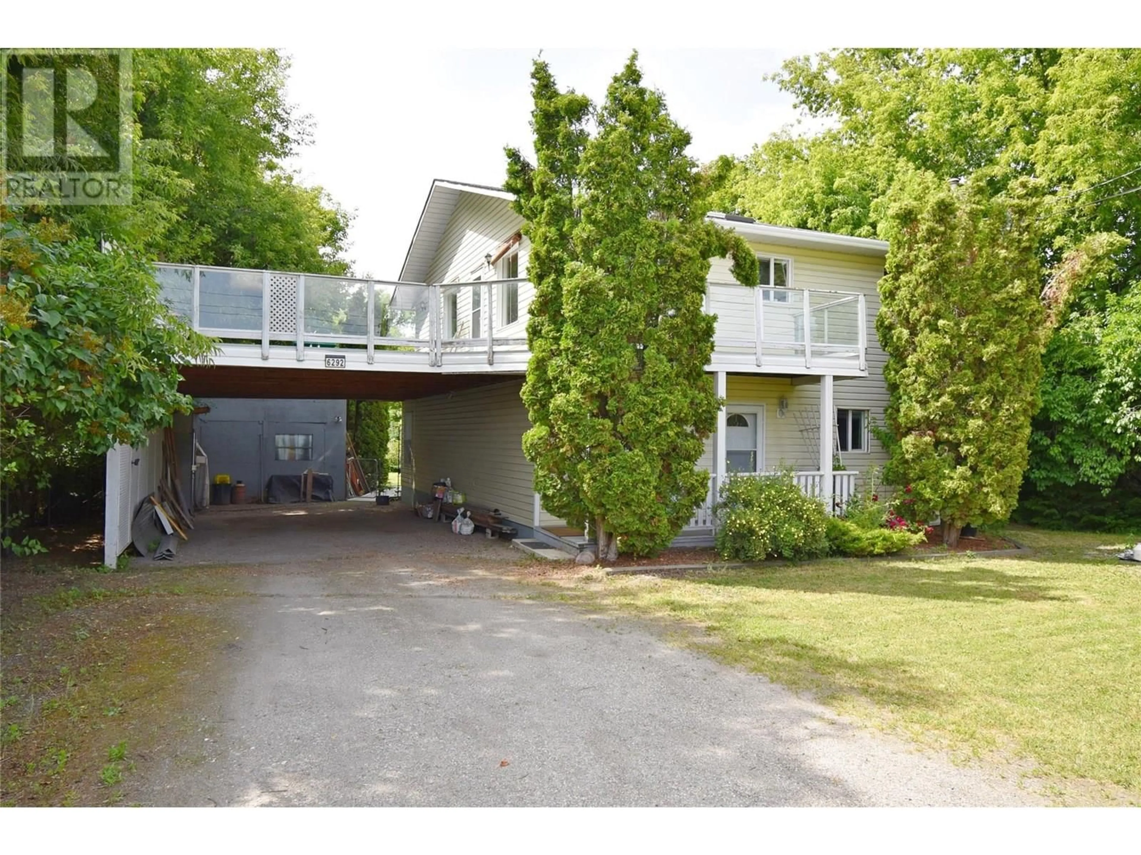 A pic from outside/outdoor area/front of a property/back of a property/a pic from drone, street for 6292 STICKLE ROAD, Vernon British Columbia V1B3R2
