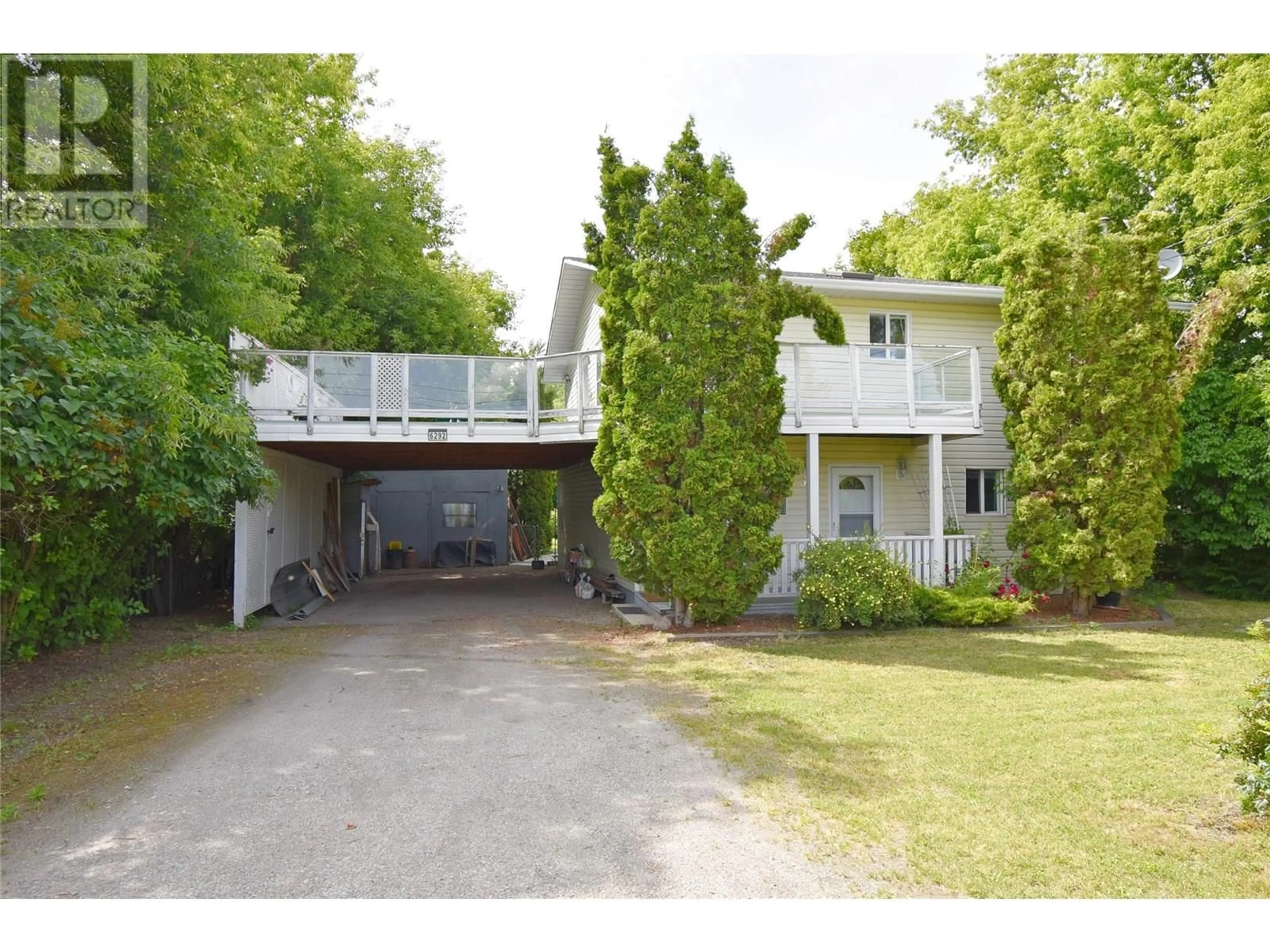 A pic from outside/outdoor area/front of a property/back of a property/a pic from drone, street for 6292 STICKLE ROAD, Vernon British Columbia V1B3R2