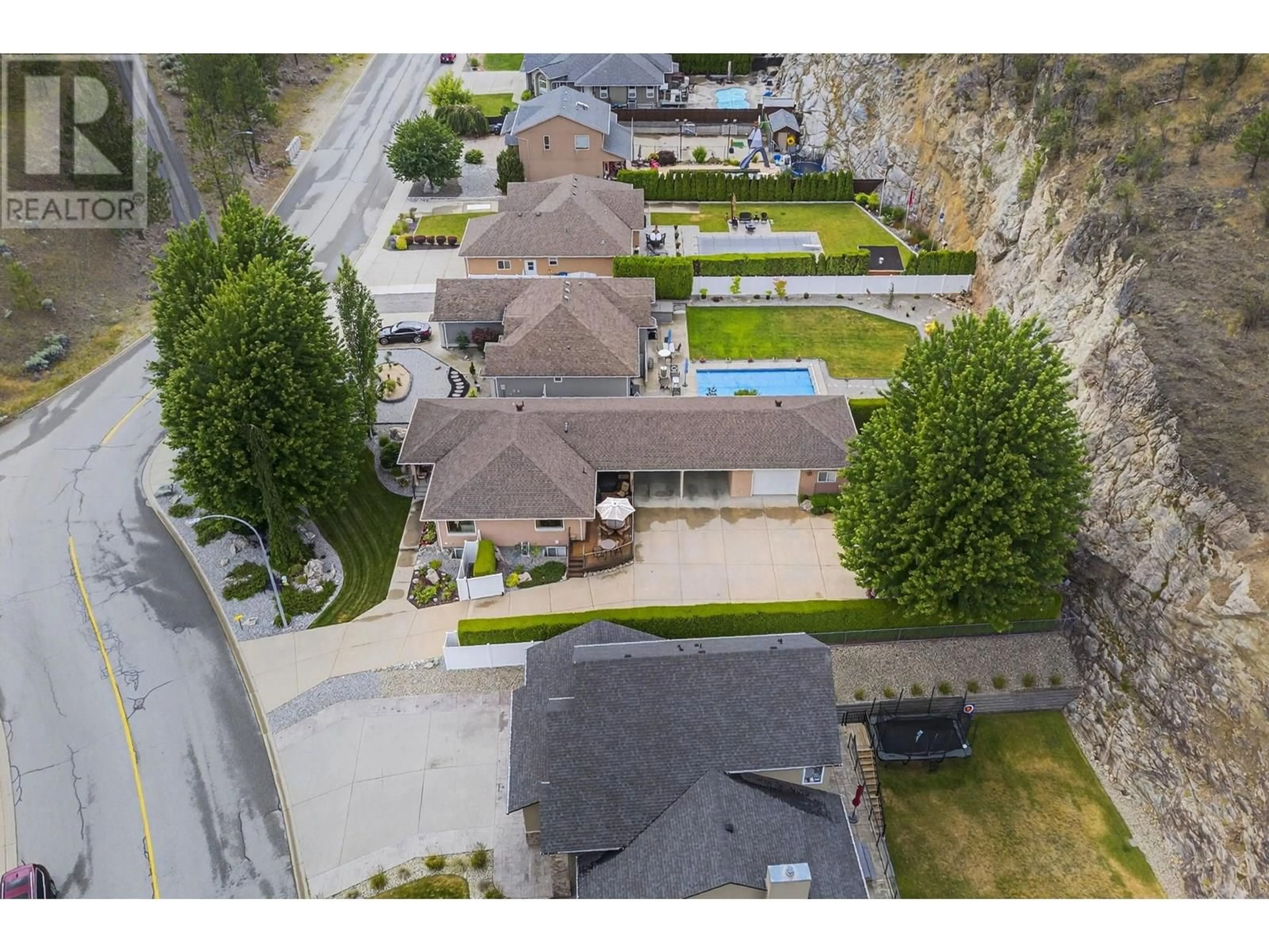 A pic from outside/outdoor area/front of a property/back of a property/a pic from drone, street for 3021 EVERGREEN DRIVE, Penticton British Columbia V2A9A9