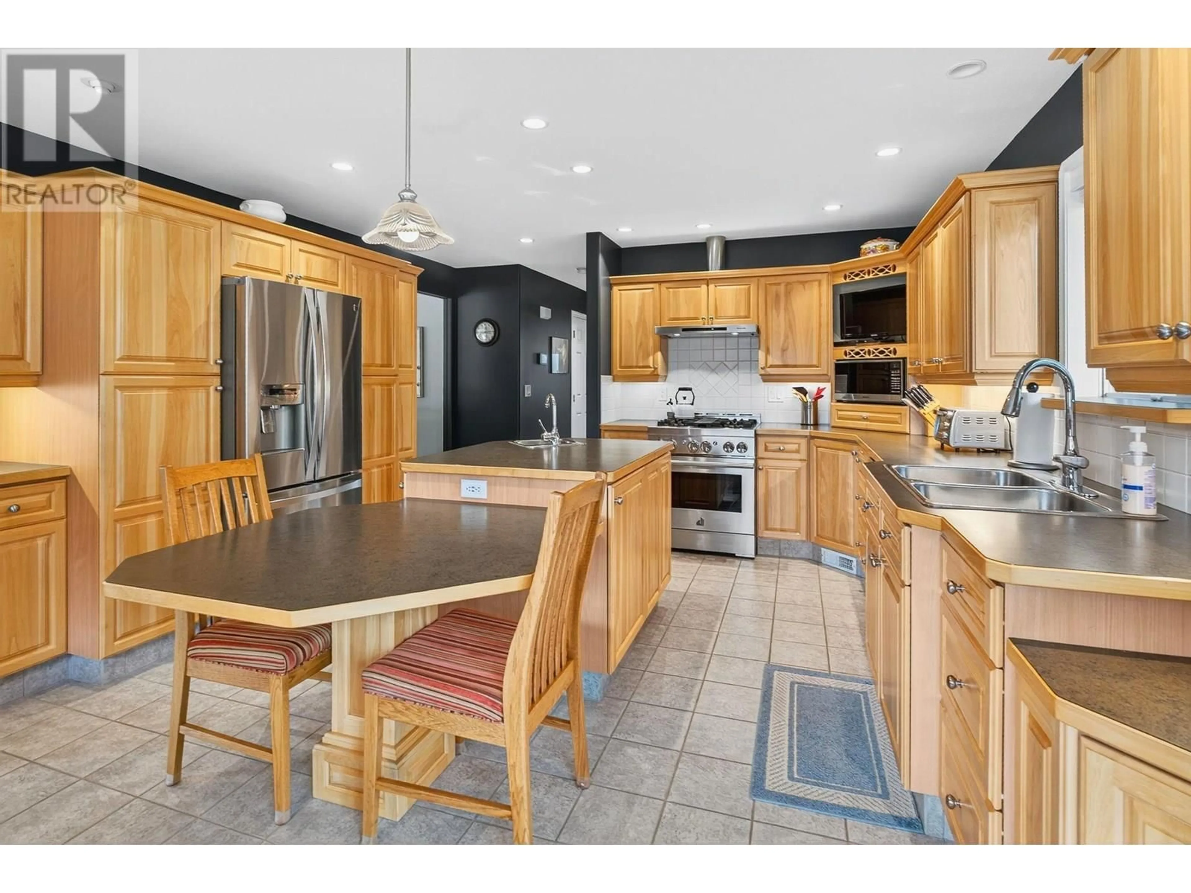 Open concept kitchen, ceramic/tile floor for 3021 EVERGREEN DRIVE, Penticton British Columbia V2A9A9
