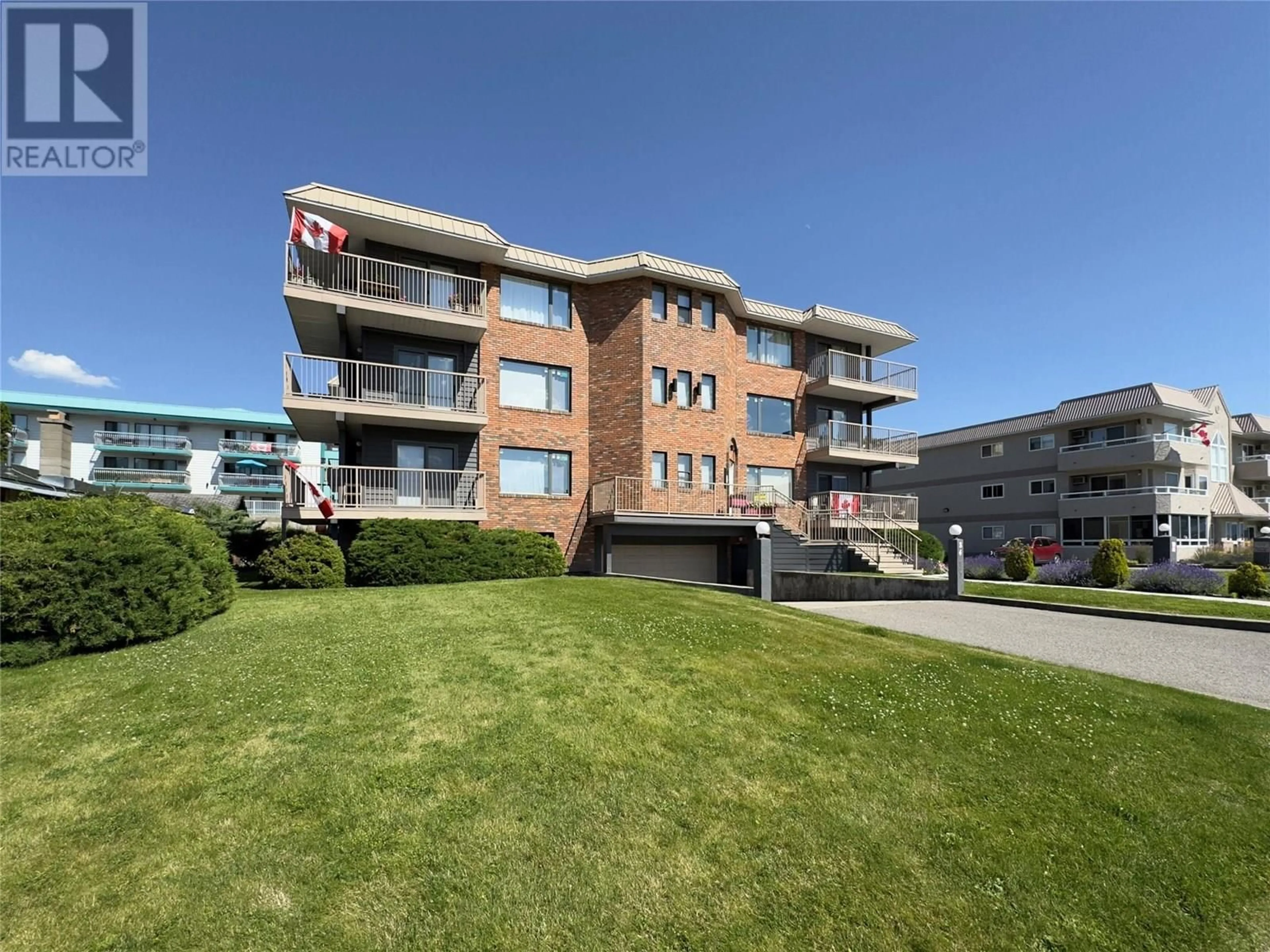 A pic from outside/outdoor area/front of a property/back of a property/a pic from drone, building for 203 - 84 VAN HORNE STREET, Penticton British Columbia V2A4J8