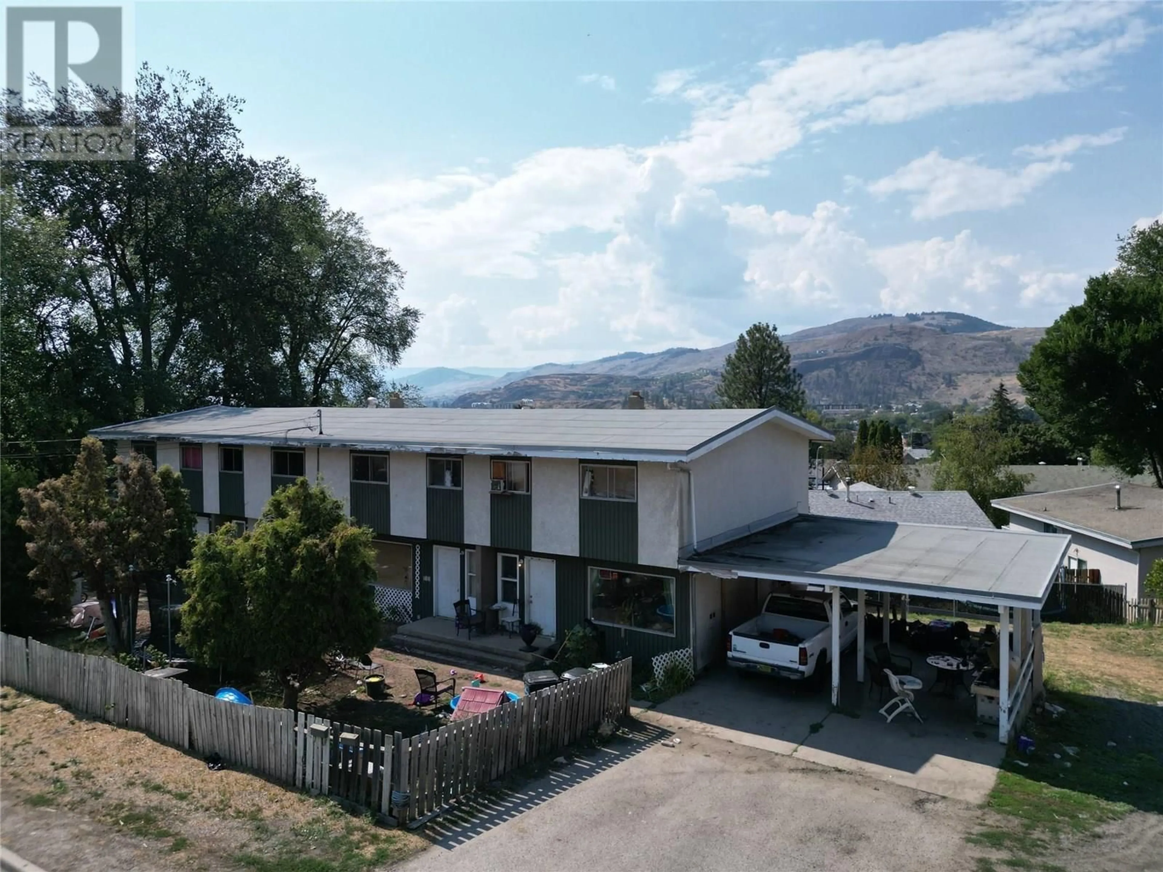 A pic from outside/outdoor area/front of a property/back of a property/a pic from drone, mountain view for 1,2,3,4 - 3700 PLEASANT VALLEY ROAD, Vernon British Columbia V1H1R4