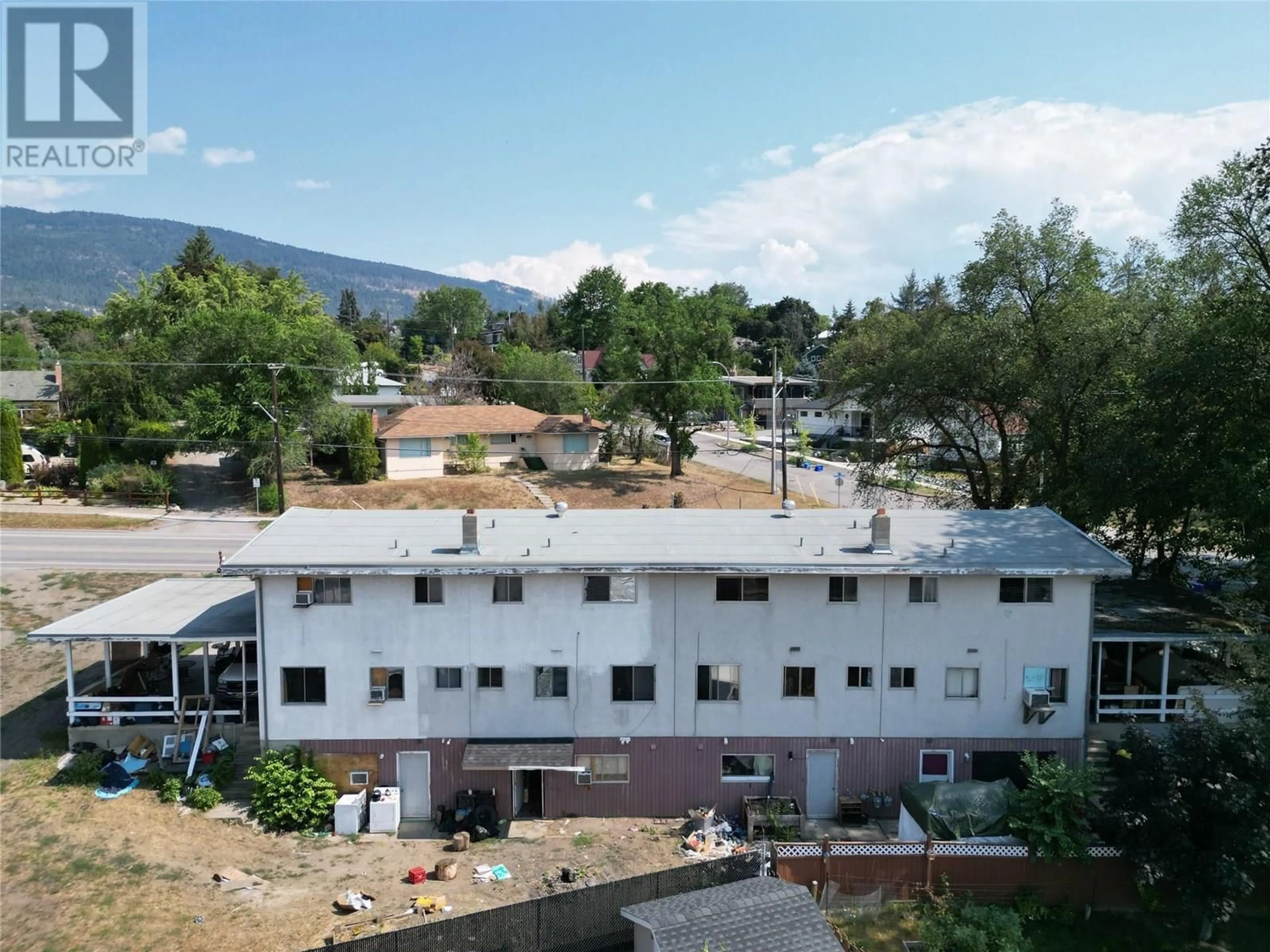 A pic from outside/outdoor area/front of a property/back of a property/a pic from drone, mountain view for 1,2,3,4 - 3700 PLEASANT VALLEY ROAD, Vernon British Columbia V1H1R4