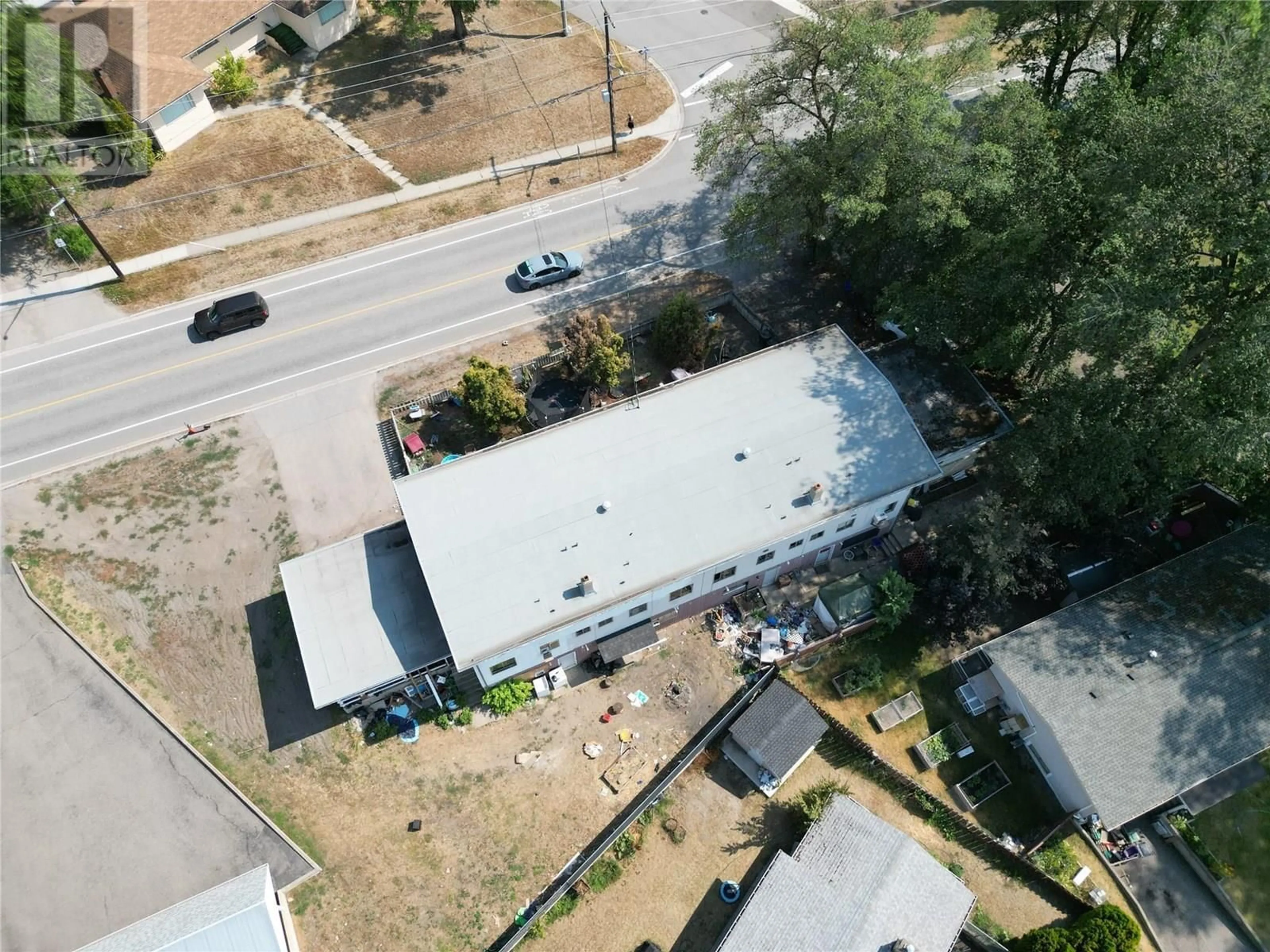A pic from outside/outdoor area/front of a property/back of a property/a pic from drone, street for 1,2,3,4 - 3700 PLEASANT VALLEY ROAD, Vernon British Columbia V1H1R4