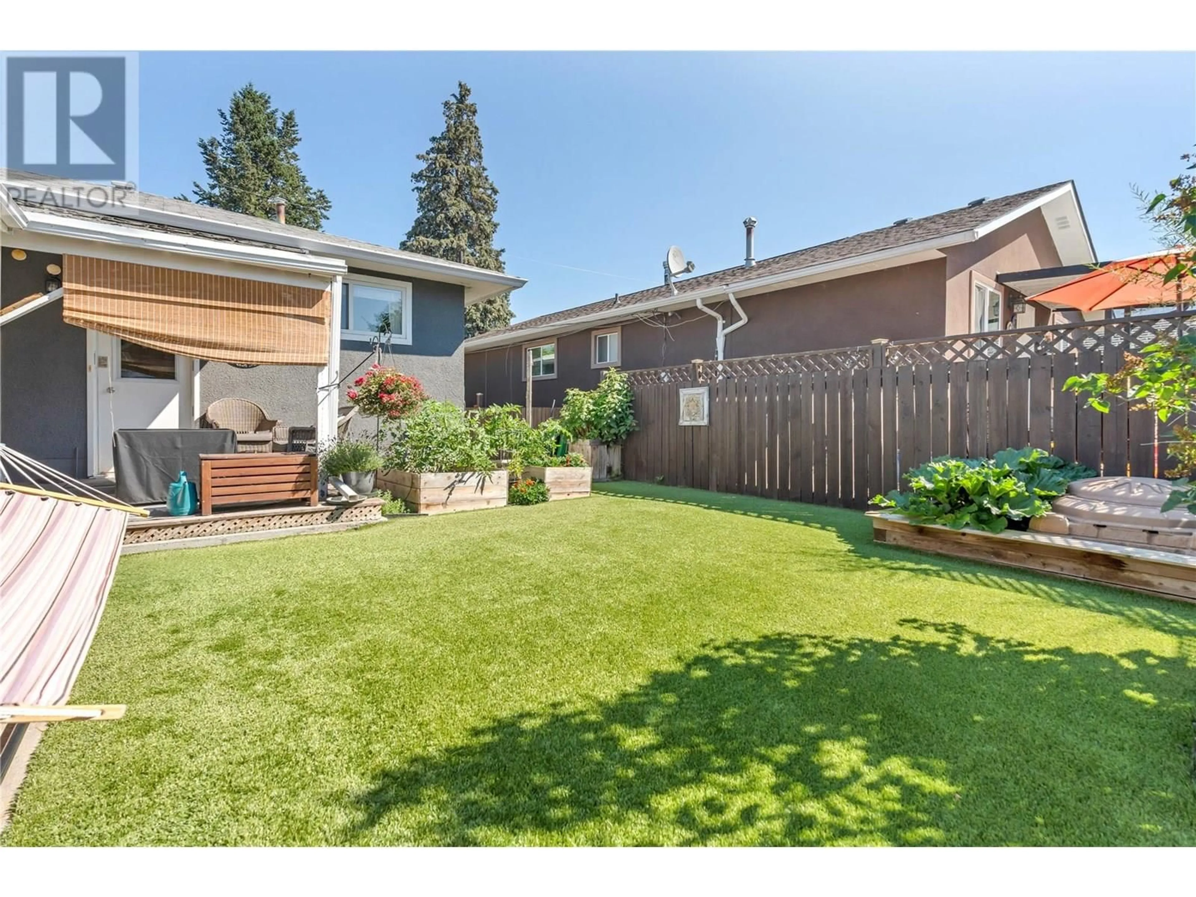 A pic from outside/outdoor area/front of a property/back of a property/a pic from drone, street for 550 GAHAN AVENUE, Penticton British Columbia V2A2C7