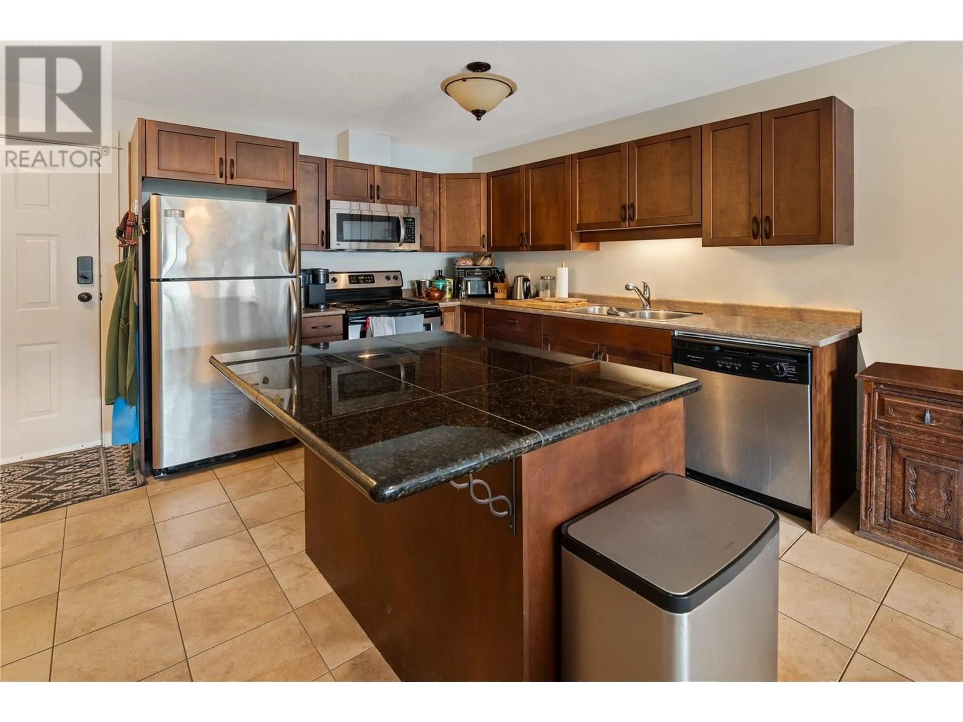 Standard kitchen, ceramic/tile floor for 406 - 3350 WOODSDALE ROAD, Lake Country British Columbia V4V2R7
