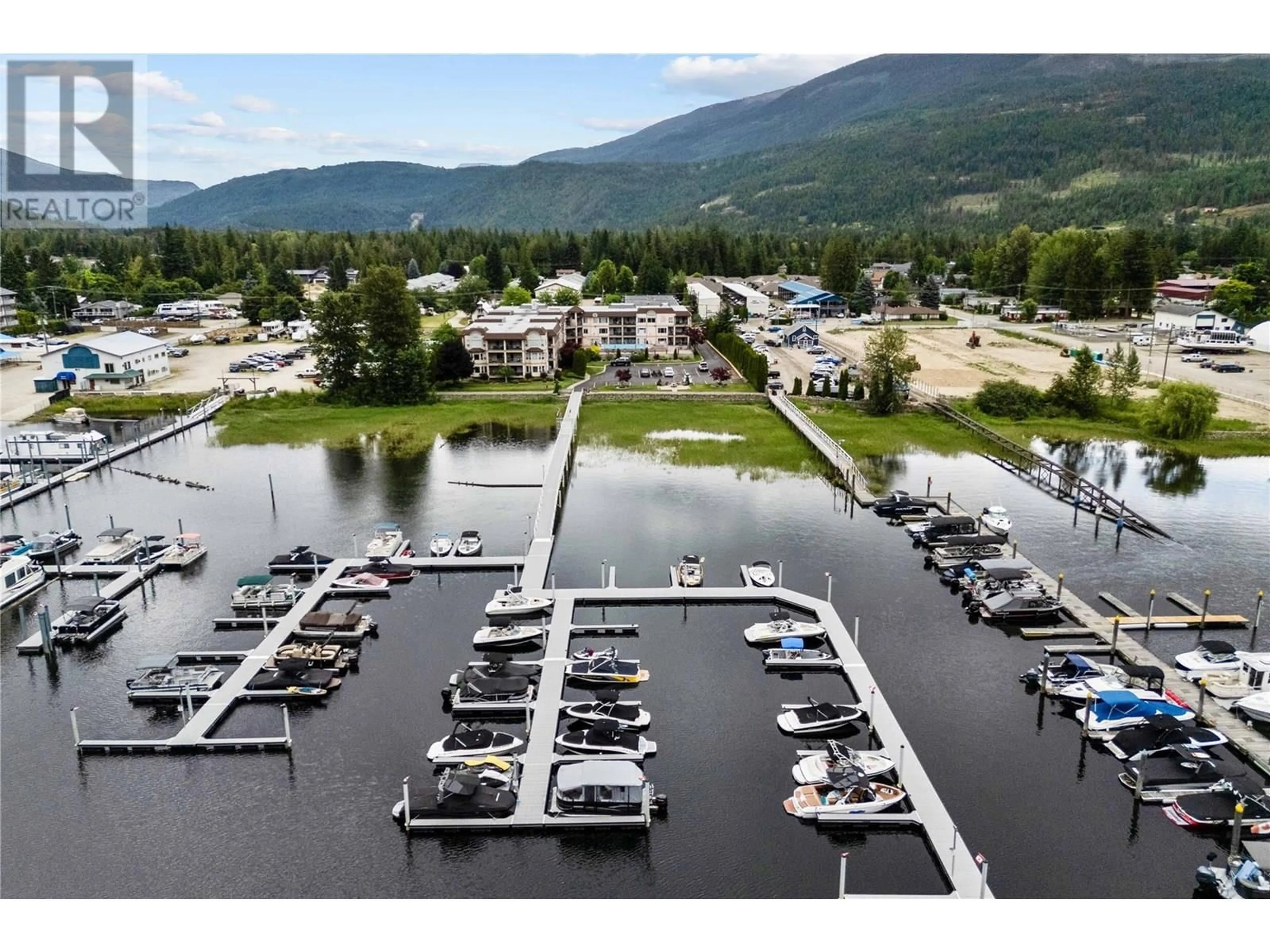 A pic from outside/outdoor area/front of a property/back of a property/a pic from drone, water/lake/river/ocean view for 119 - 1002 RIVERSIDE AVENUE, Sicamous British Columbia V0E2V1