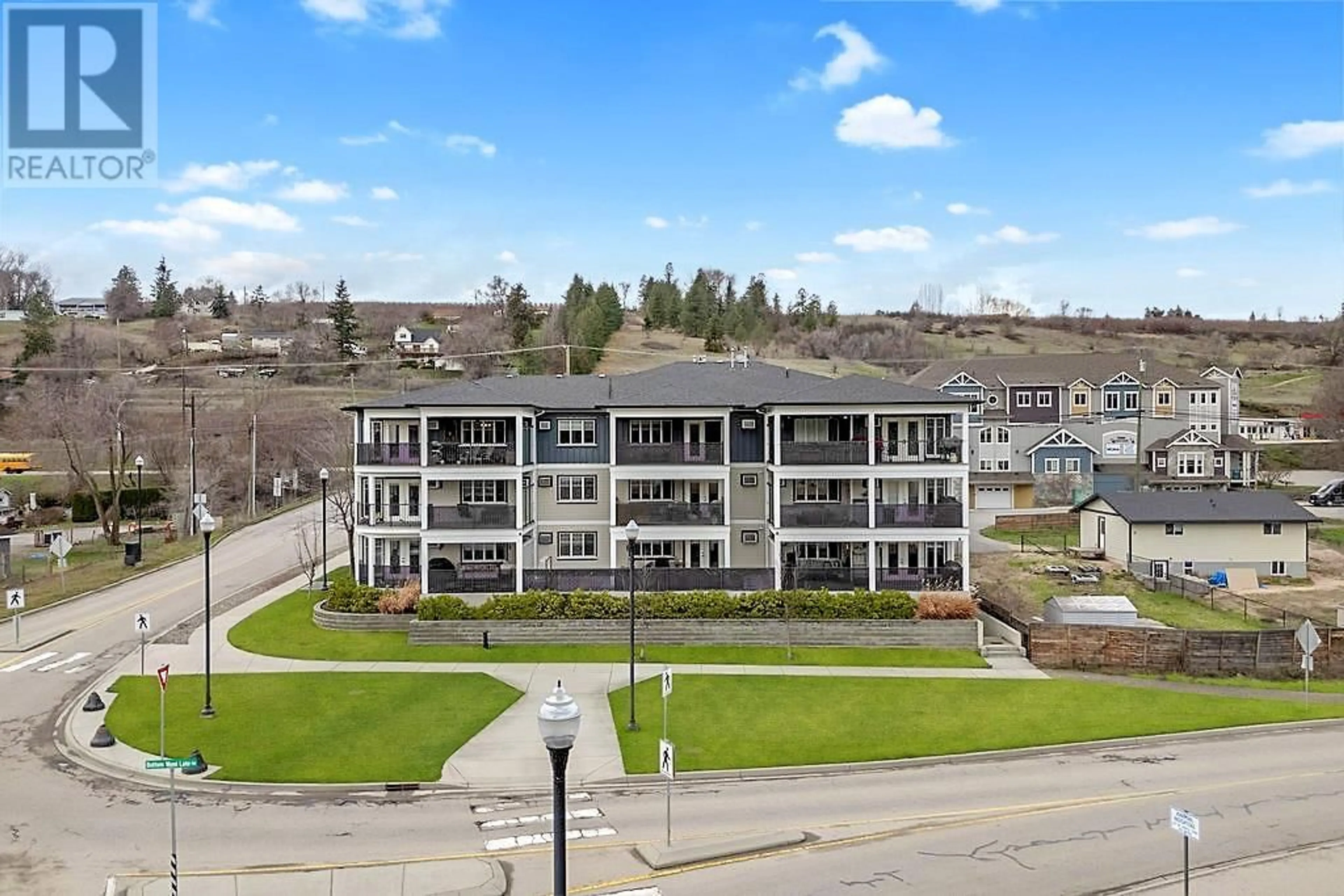 A pic from outside/outdoor area/front of a property/back of a property/a pic from drone, unknown for 101 - 10529 POWLEY COURT, Lake Country British Columbia V4V2S2