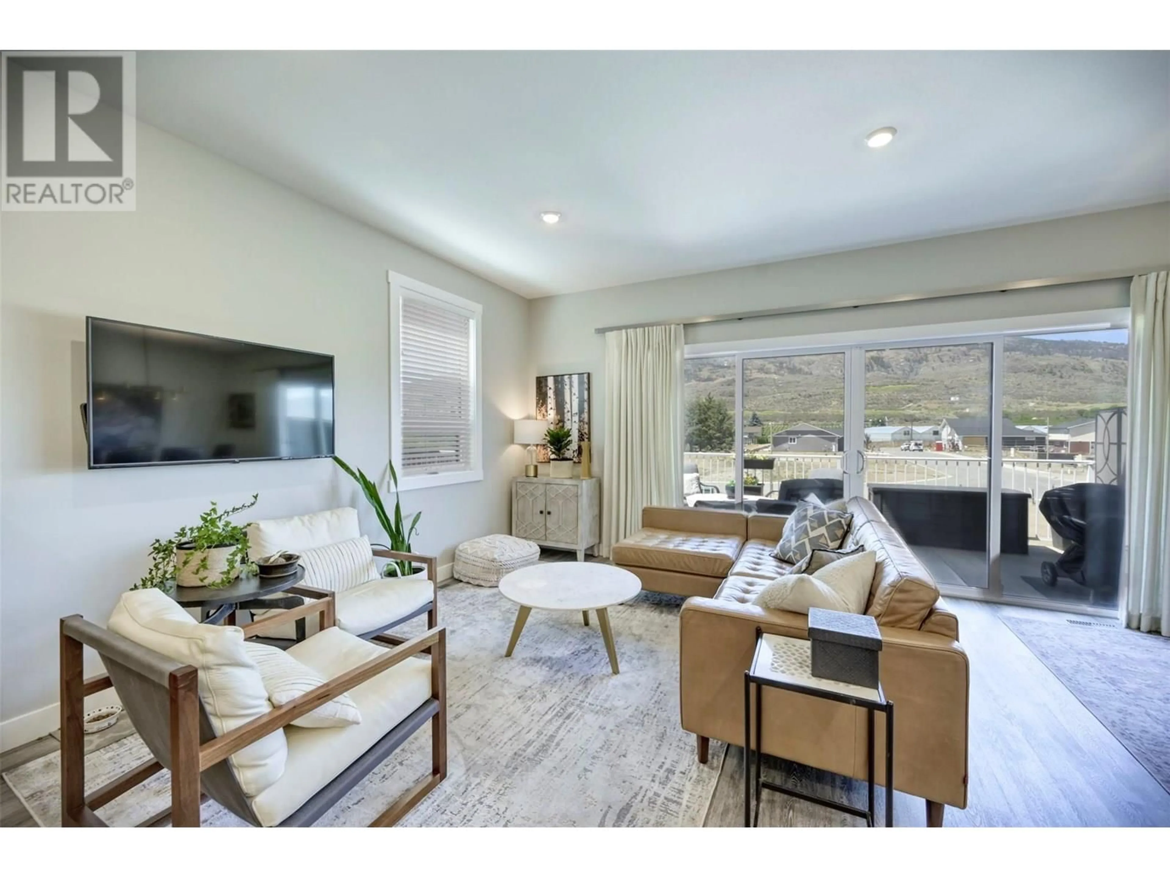 Living room with furniture, unknown for 7012 WREN DRIVE, Osoyoos British Columbia V0H1V6