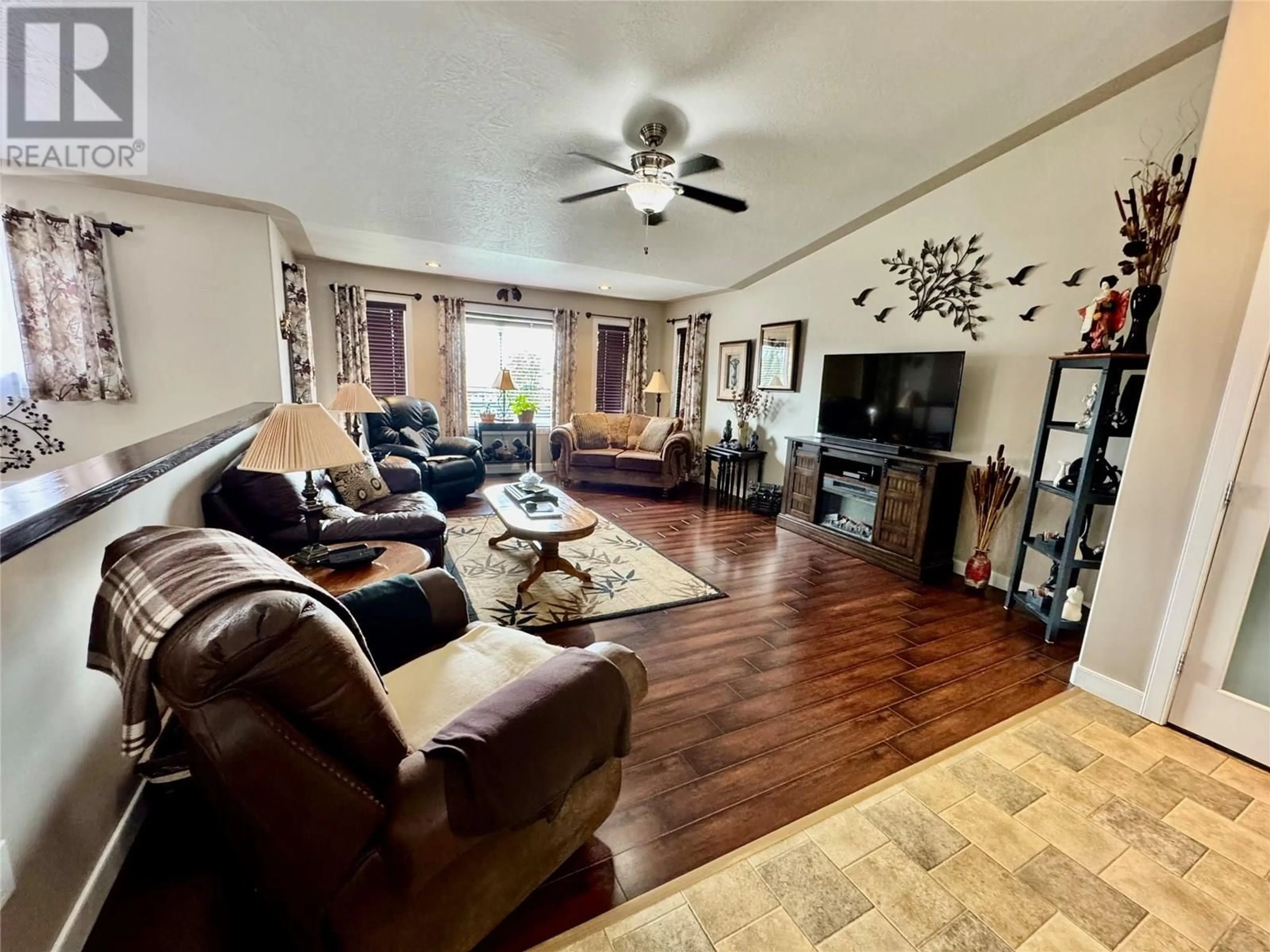 Living room with furniture, unknown for 1816 93 AVENUE, Dawson Creek British Columbia V1G1E8