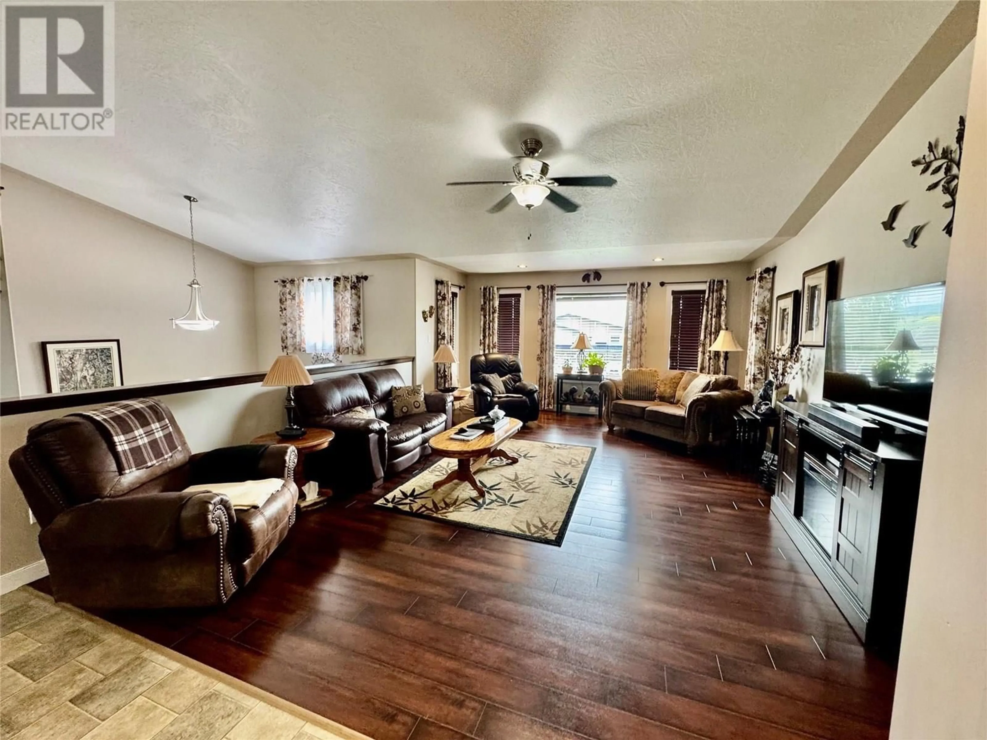 Living room with furniture, unknown for 1816 93 AVENUE, Dawson Creek British Columbia V1G1E8