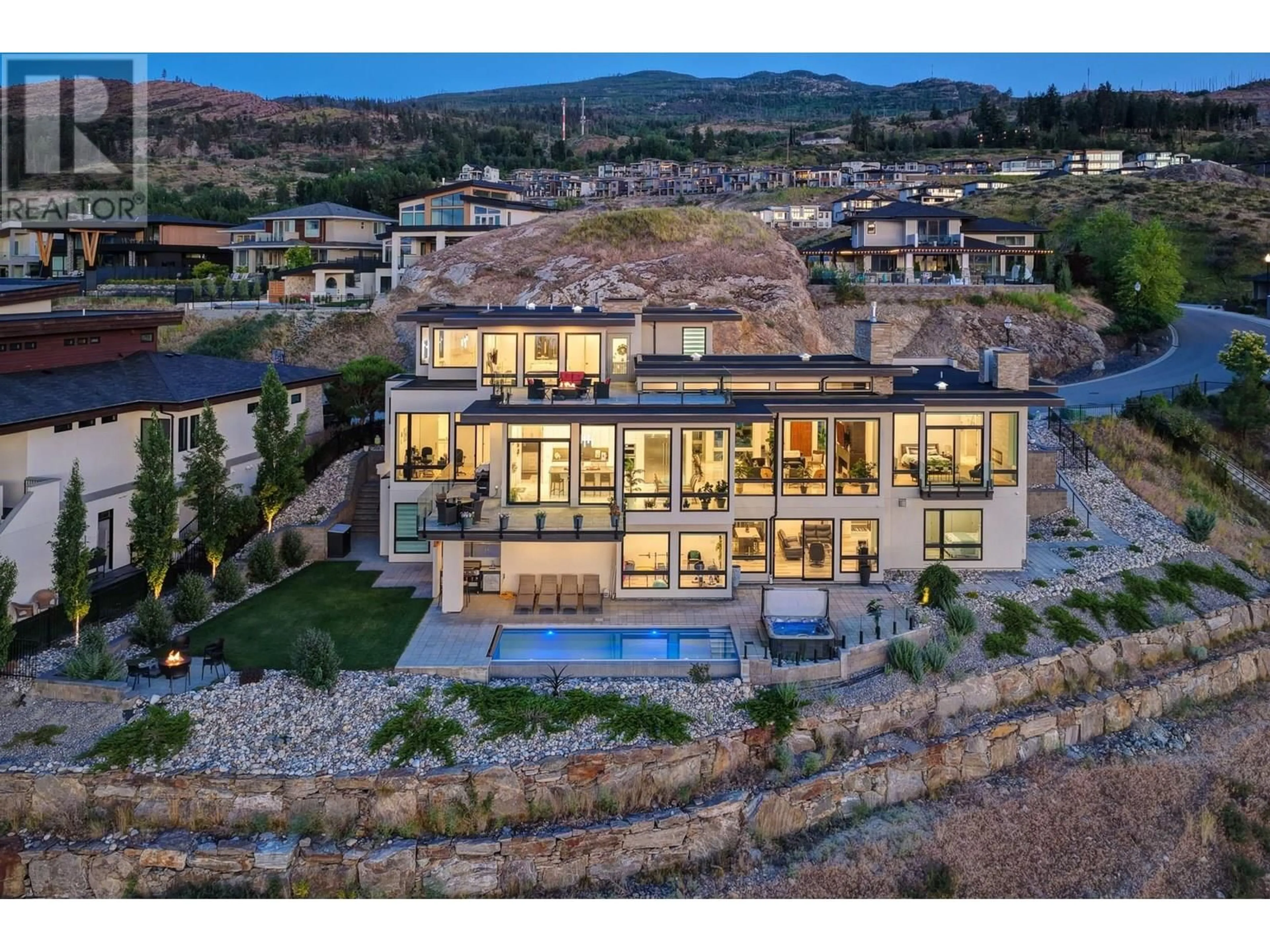 A pic from outside/outdoor area/front of a property/back of a property/a pic from drone, mountain view for 449 SWAN DRIVE, Kelowna British Columbia V1W5L9
