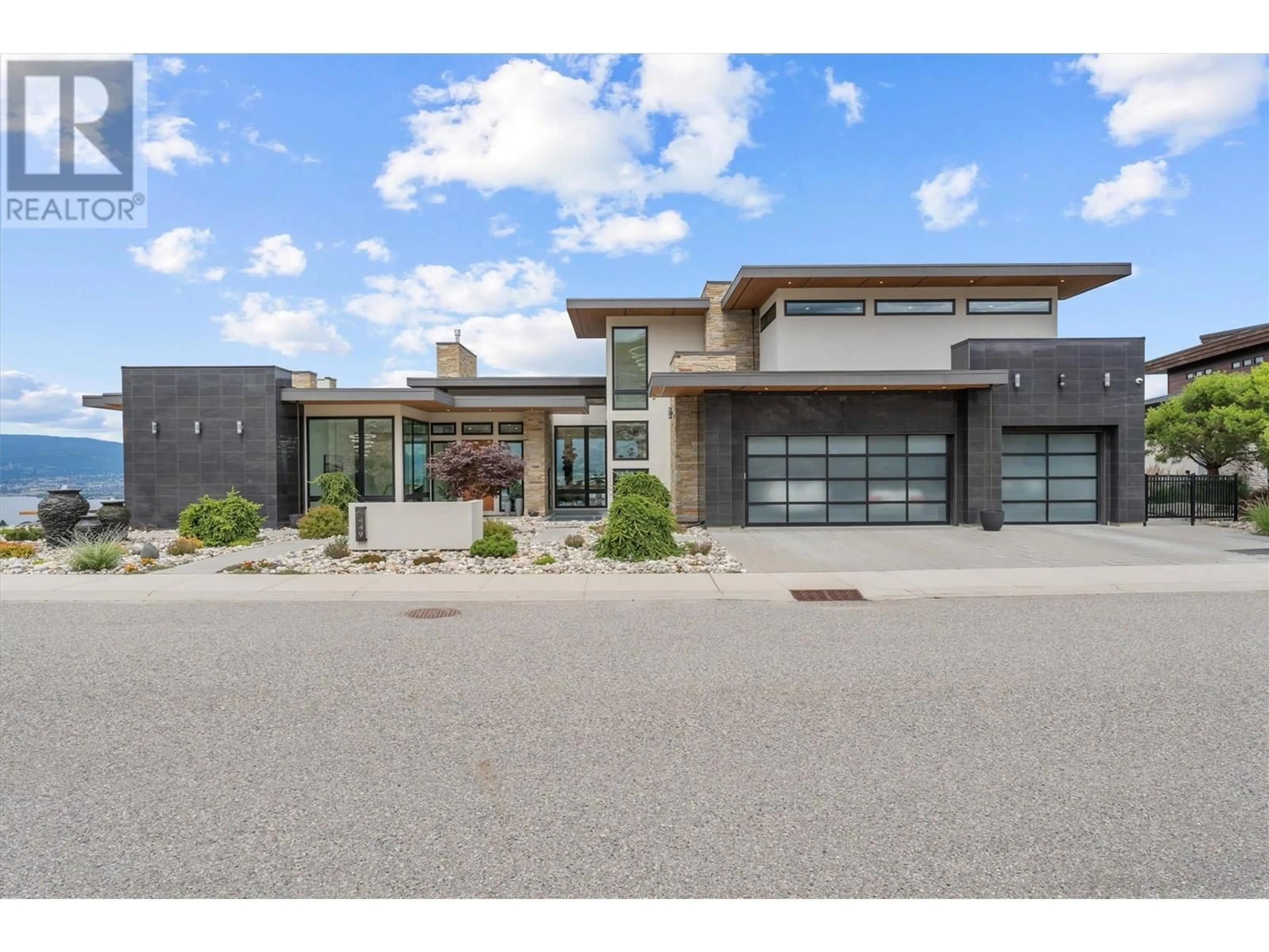 Home with brick exterior material, street for 449 SWAN DRIVE, Kelowna British Columbia V1W5L9