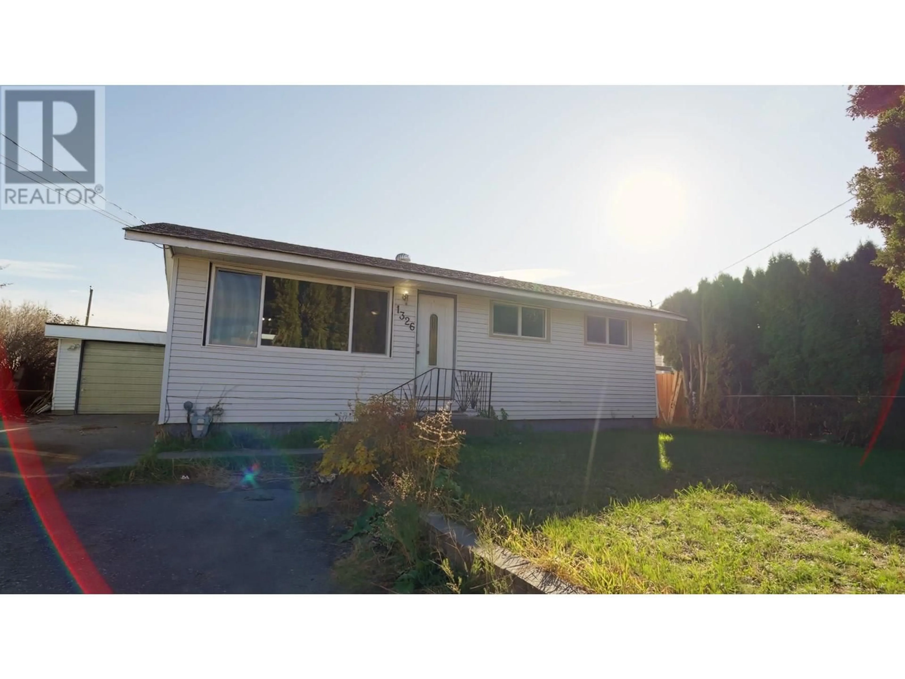 Home with vinyl exterior material, street for 1326 PARCEL STREET, Merritt British Columbia V1K1B8