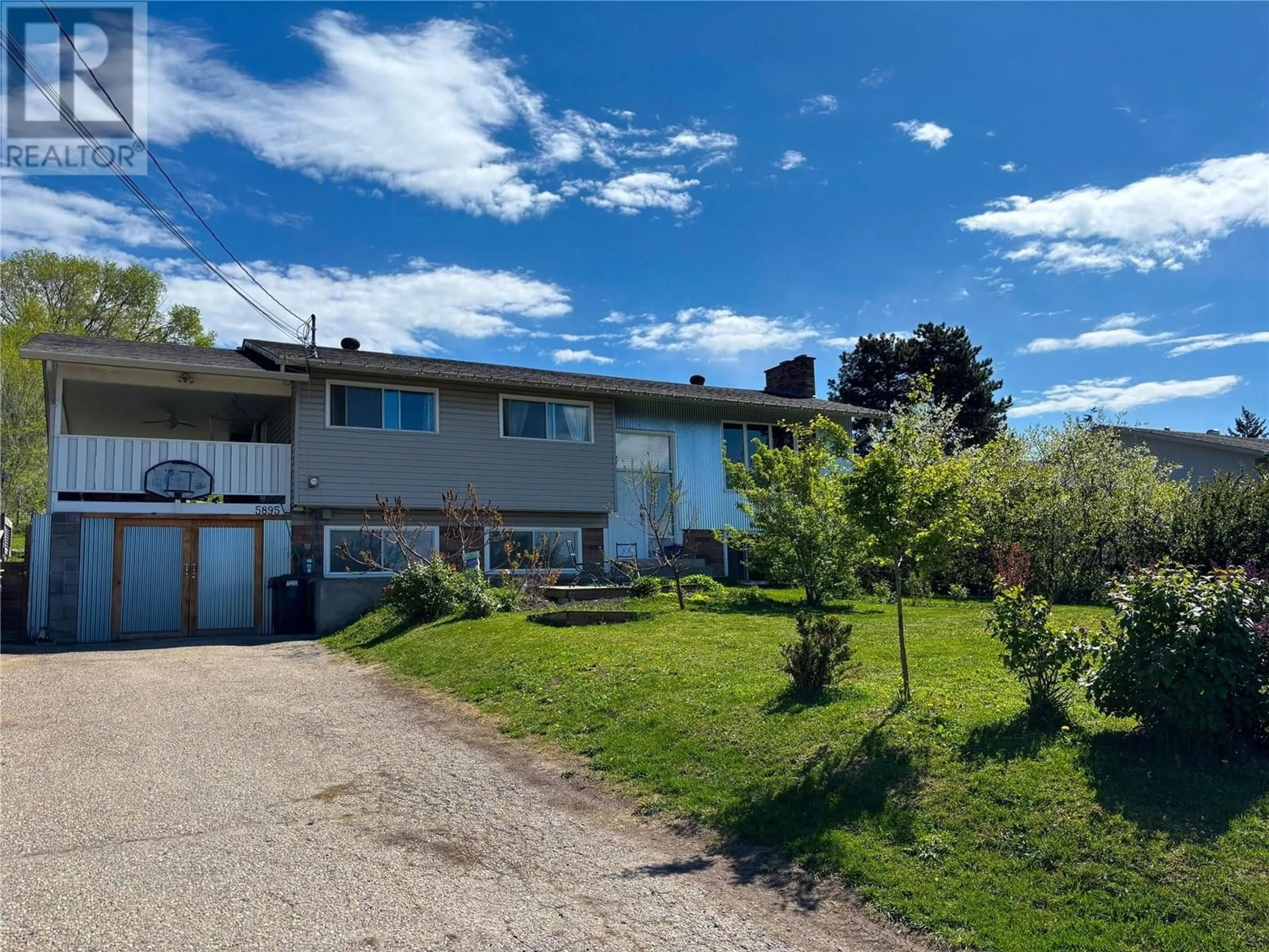 A pic from outside/outdoor area/front of a property/back of a property/a pic from drone, unknown for 5895 COLLISON ROAD, Vernon British Columbia V1B3L4