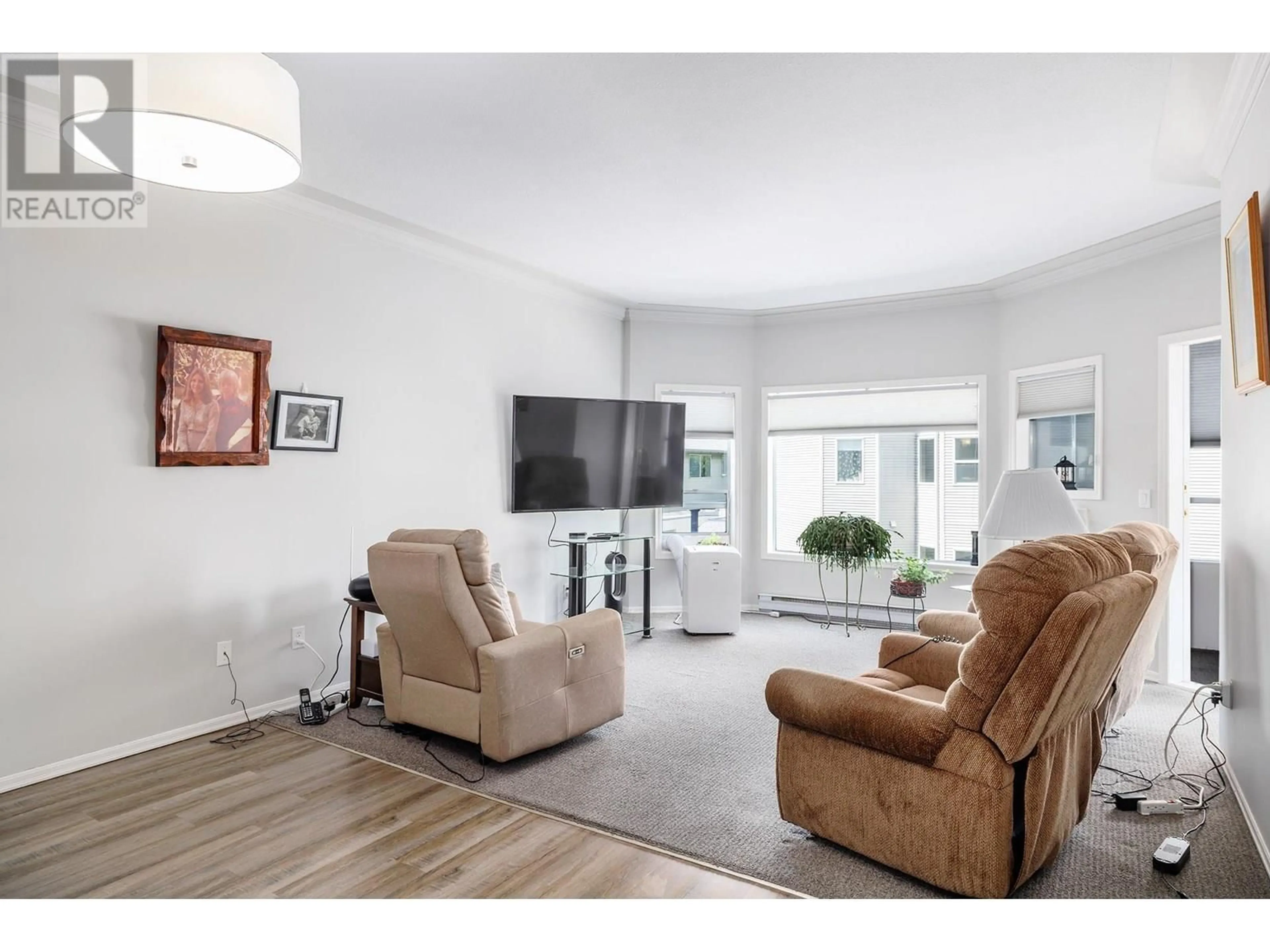 Living room with furniture, unknown for 227 - 877 KLO ROAD, Kelowna British Columbia V1Y9R1