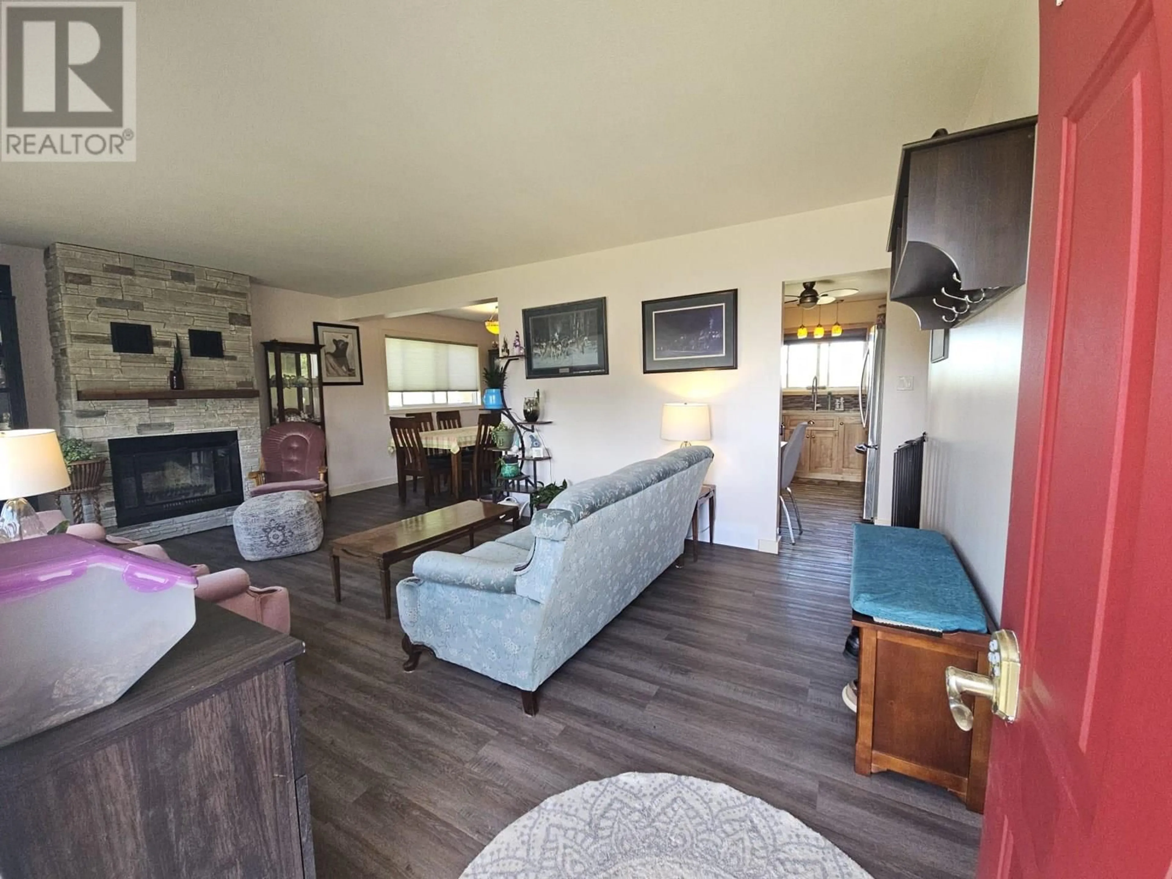 Living room with furniture, wood/laminate floor for 9220 6 STREET, Dawson Creek British Columbia V1G3L6