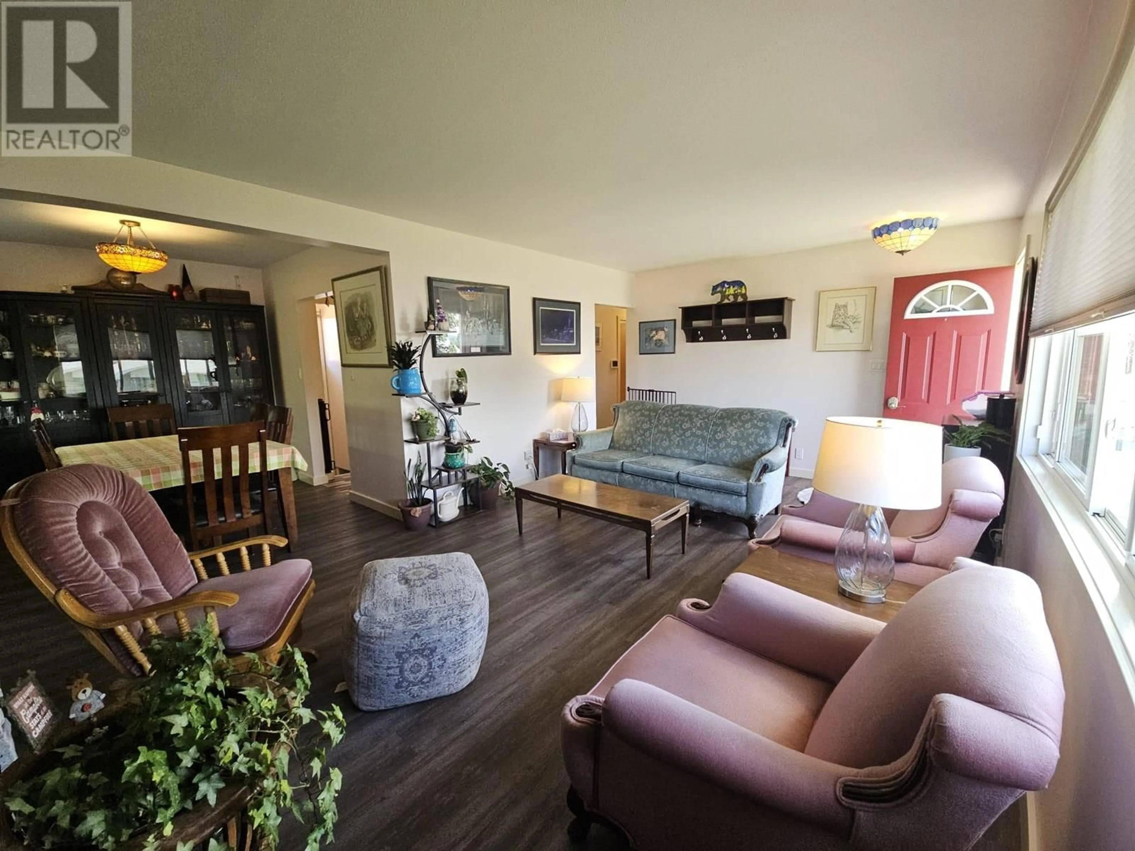 Living room with furniture, wood/laminate floor for 9220 6 STREET, Dawson Creek British Columbia V1G3L6