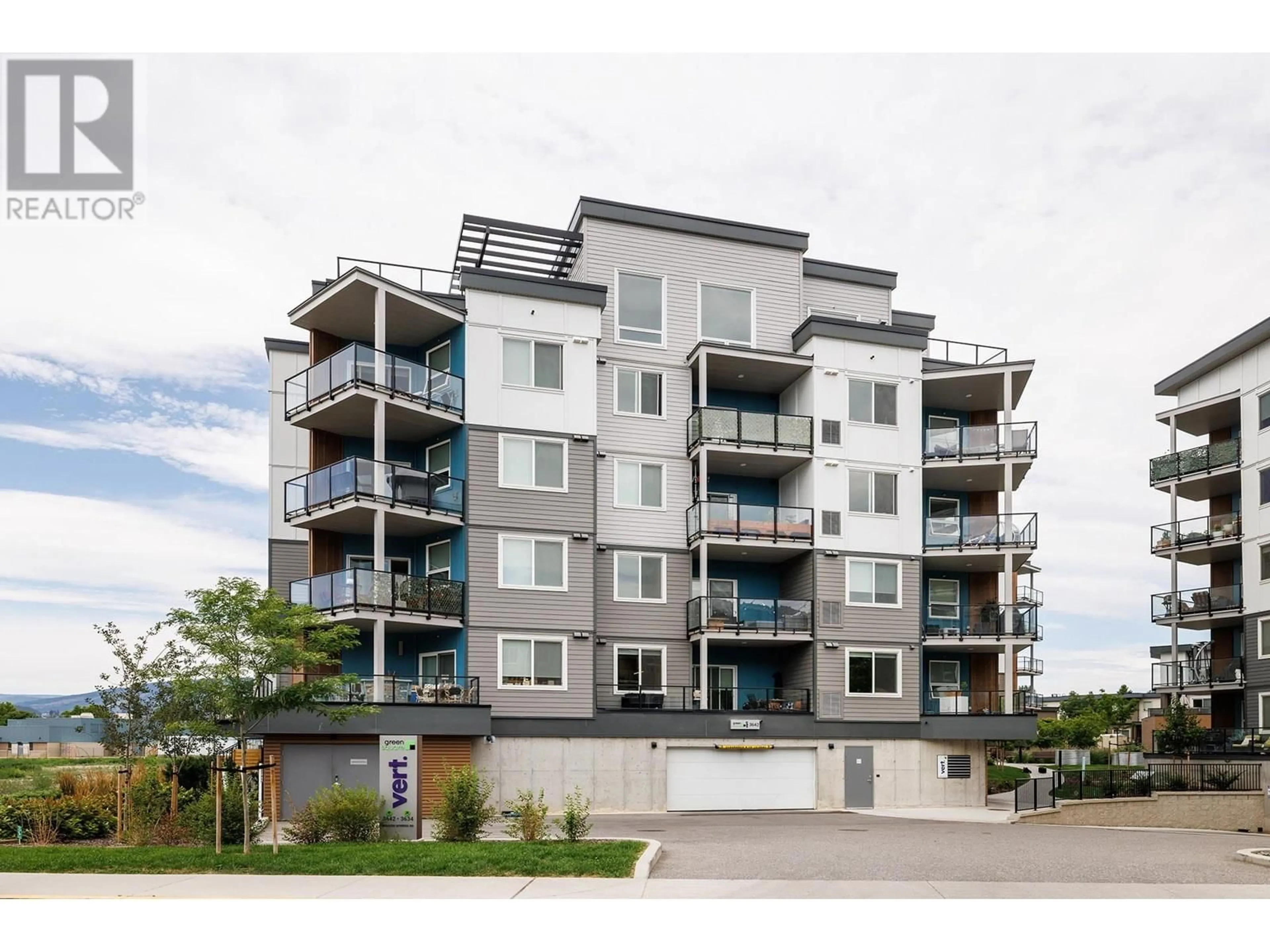 A pic from outside/outdoor area/front of a property/back of a property/a pic from drone, unknown for 303 - 3642 MISSION SPRINGS DRIVE, Kelowna British Columbia V1W0E1