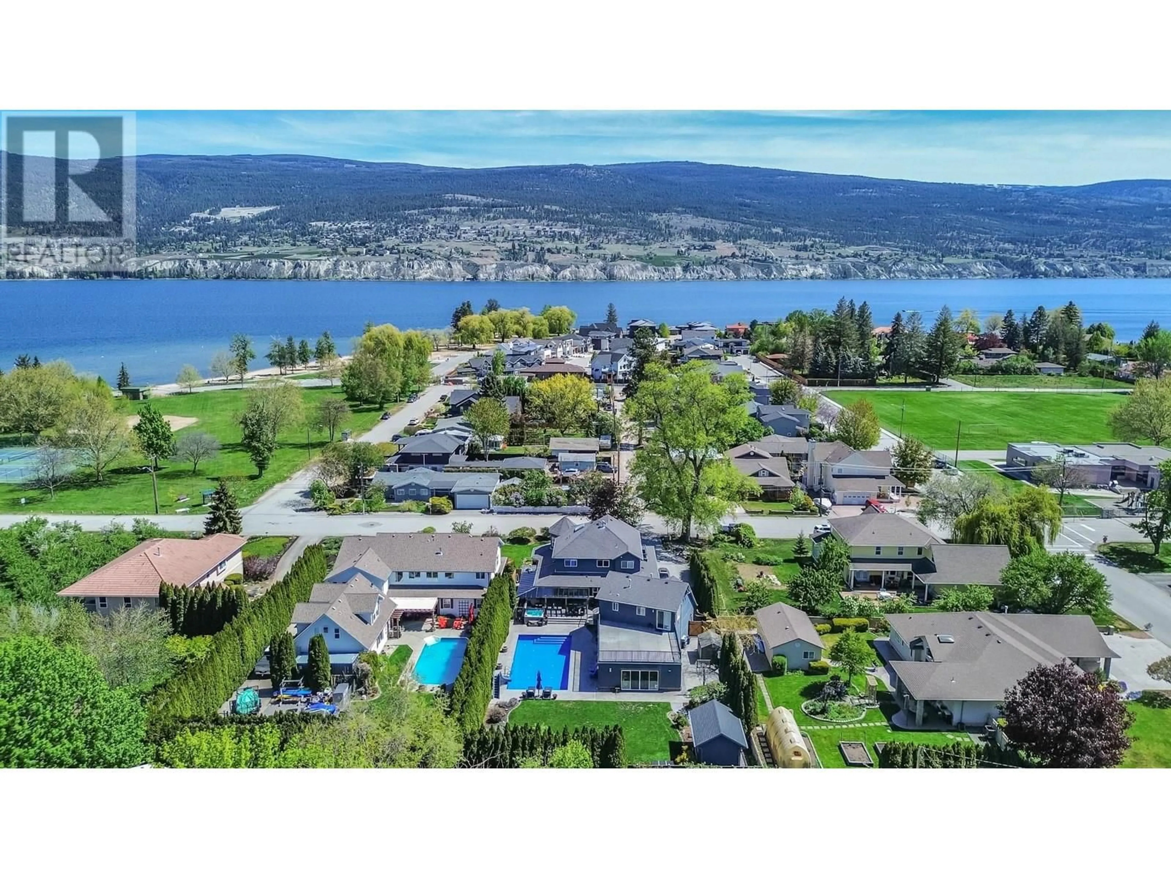 A pic from outside/outdoor area/front of a property/back of a property/a pic from drone, water/lake/river/ocean view for 6016 NIXON ROAD, Summerland British Columbia V0H1Z9