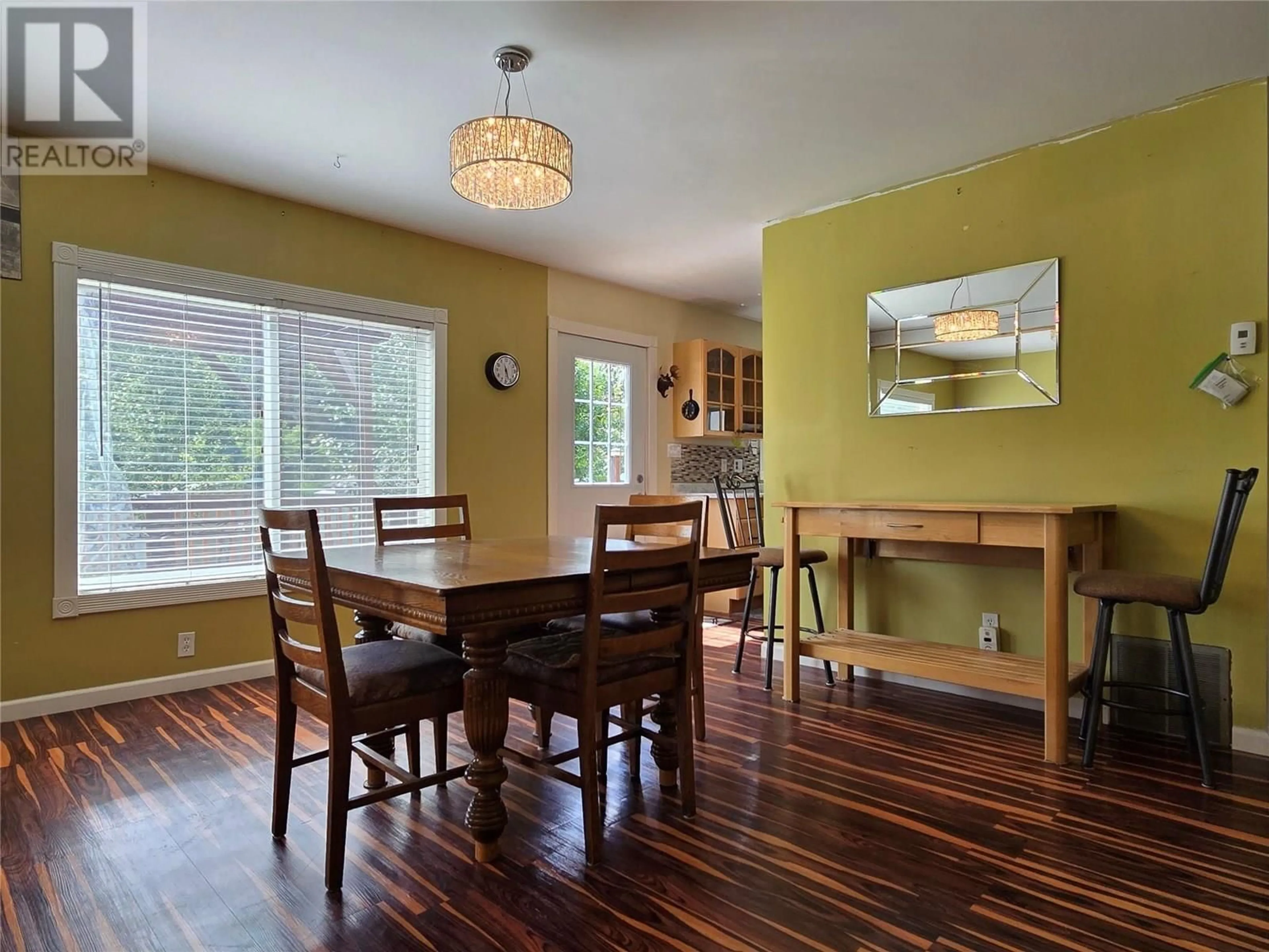 Dining room, wood/laminate floor for 1403 SOUES STREET, Clinton British Columbia V0K1K0
