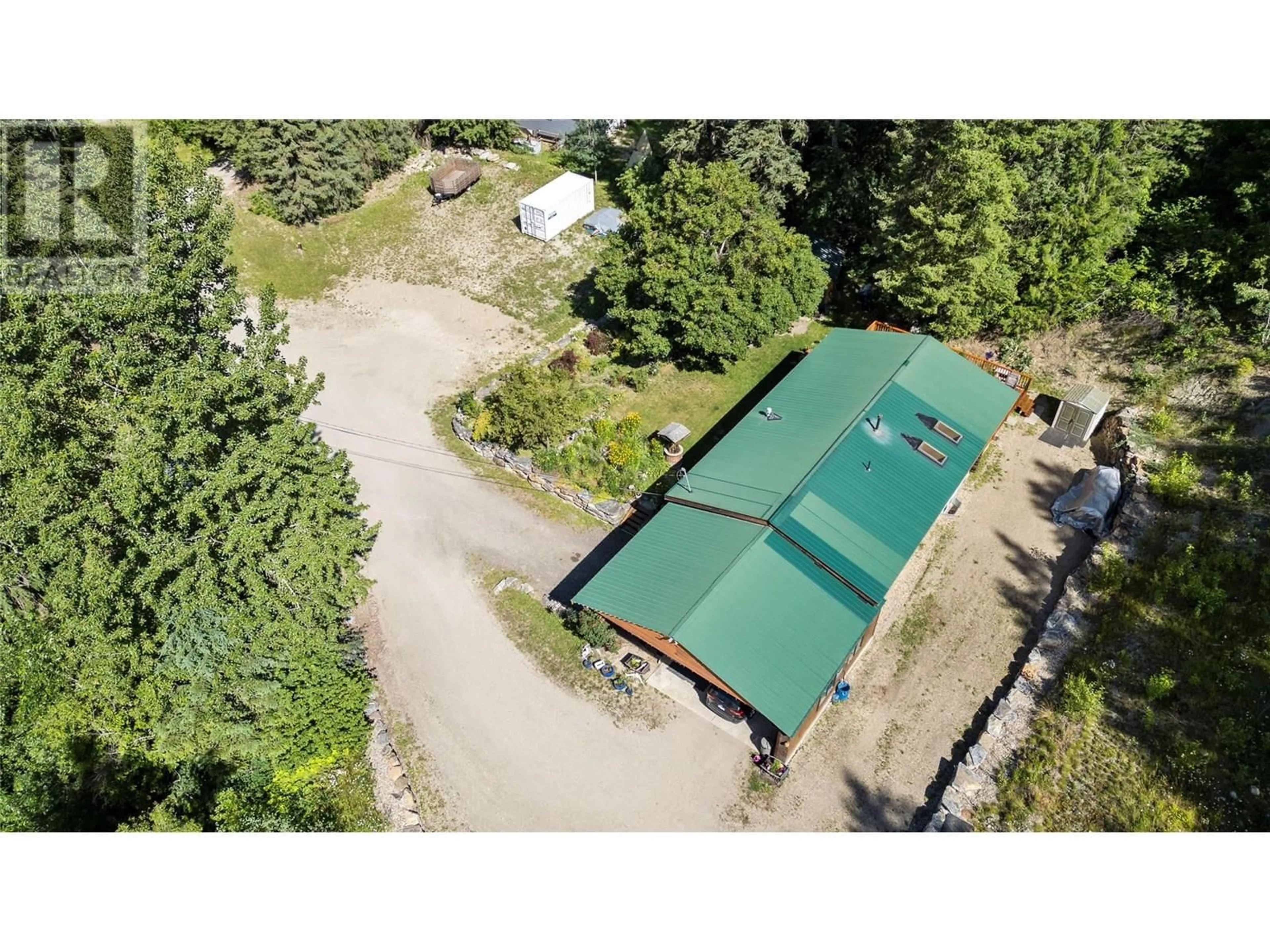 A pic from outside/outdoor area/front of a property/back of a property/a pic from drone, unknown for 6859 RANCHERO DRIVE EAST, Salmon Arm British Columbia V1E2Y5