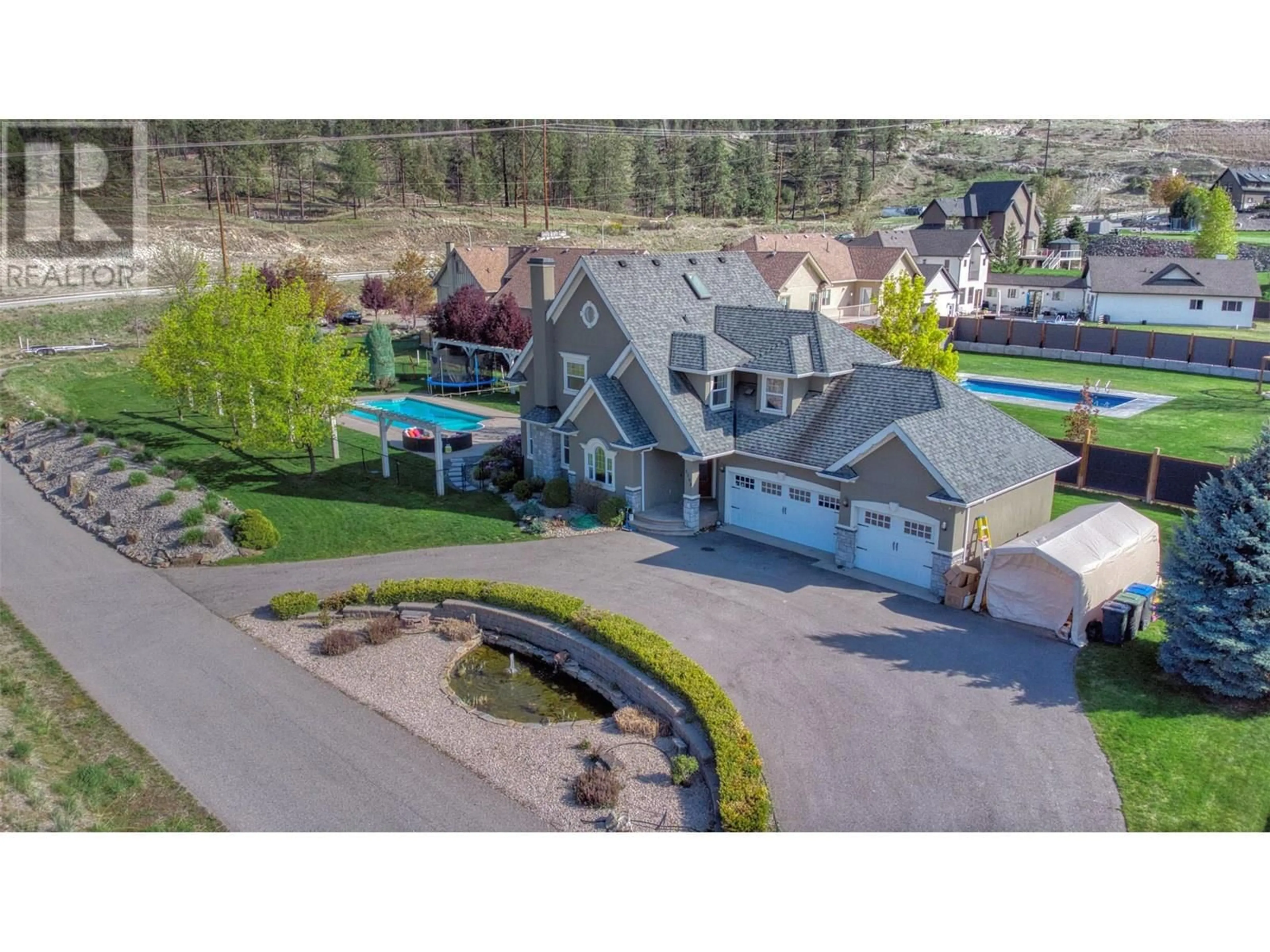 A pic from outside/outdoor area/front of a property/back of a property/a pic from drone, street for 5308 UPPER MISSION DRIVE, Kelowna British Columbia V1W3S9