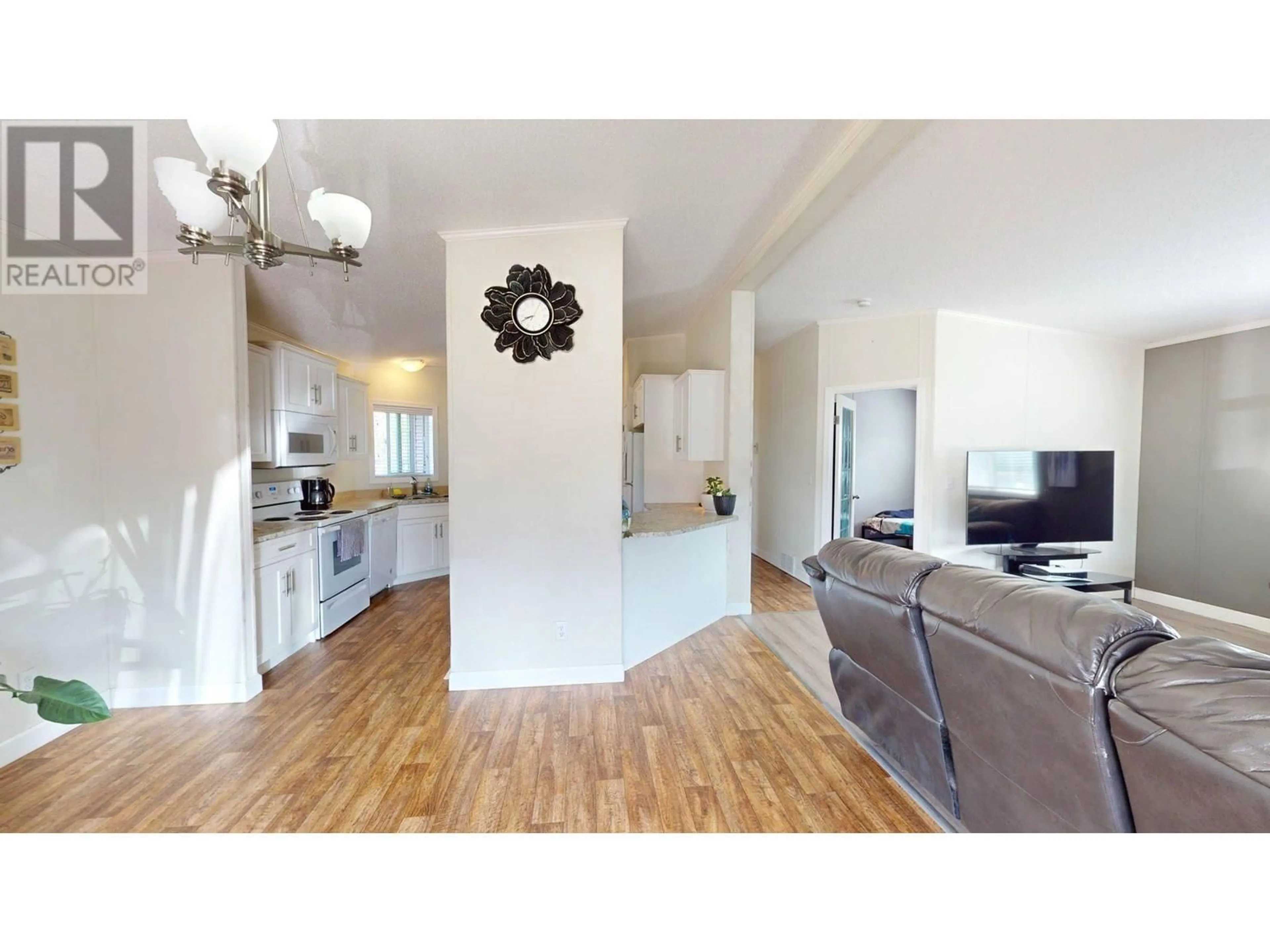 Open concept kitchen, wood/laminate floor for 11 WILDERNESS HEIGHTS DRIVE, Elkford British Columbia V0B1H0