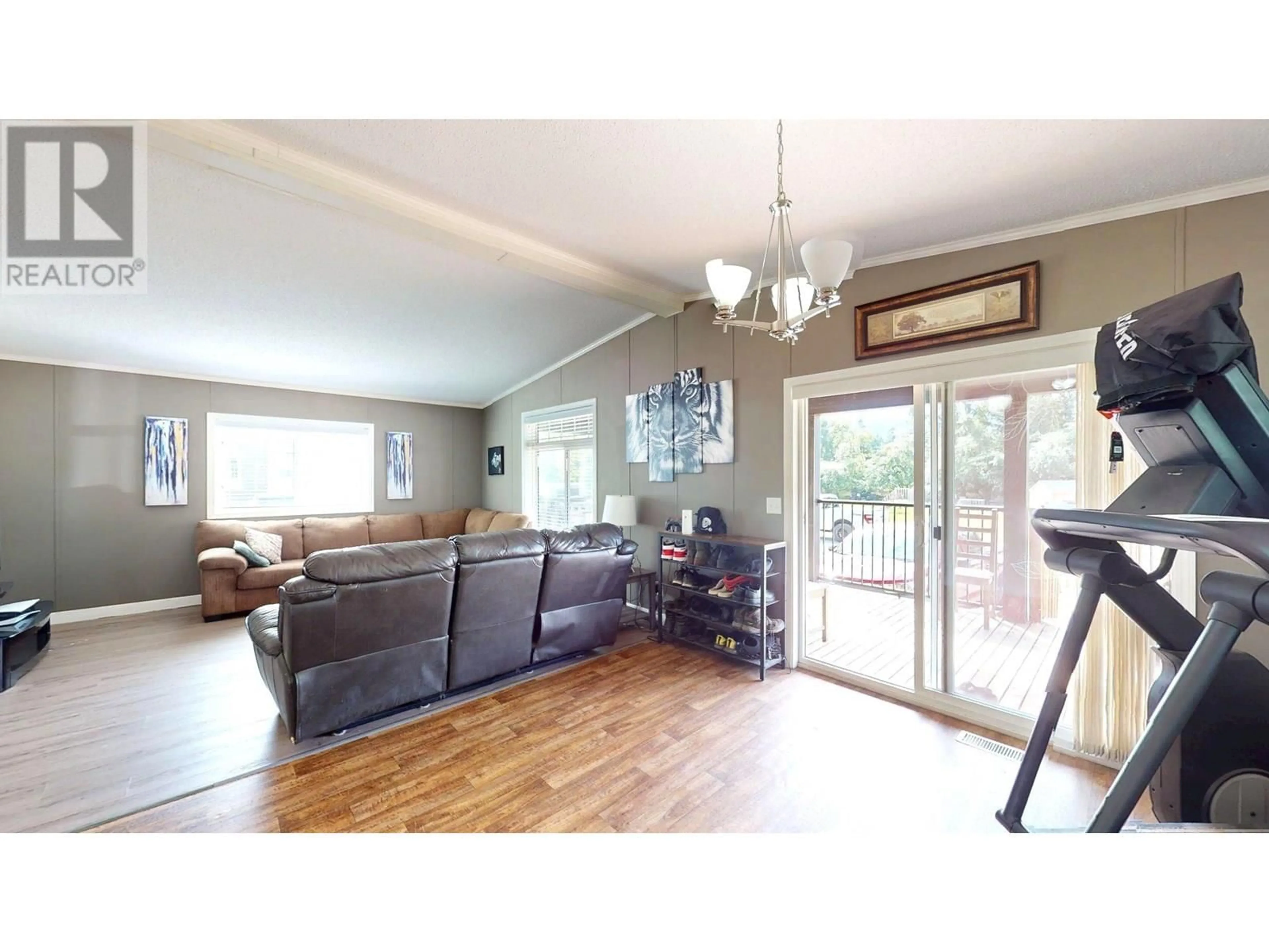 Living room with furniture, wood/laminate floor for 11 WILDERNESS HEIGHTS DRIVE, Elkford British Columbia V0B1H0