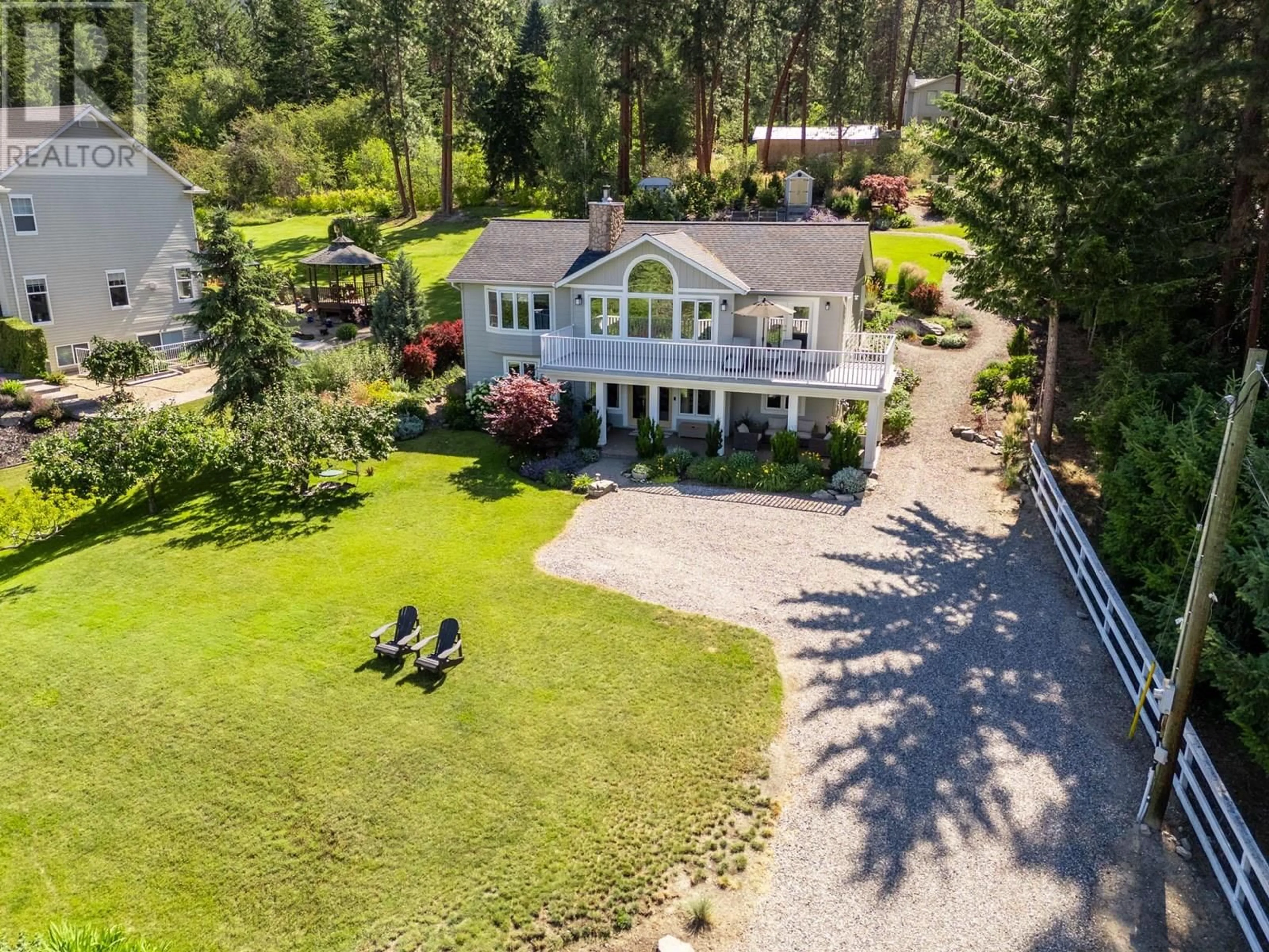 A pic from outside/outdoor area/front of a property/back of a property/a pic from drone, water/lake/river/ocean view for 16699 CARRS LANDING ROAD, Lake Country British Columbia V4V1B2