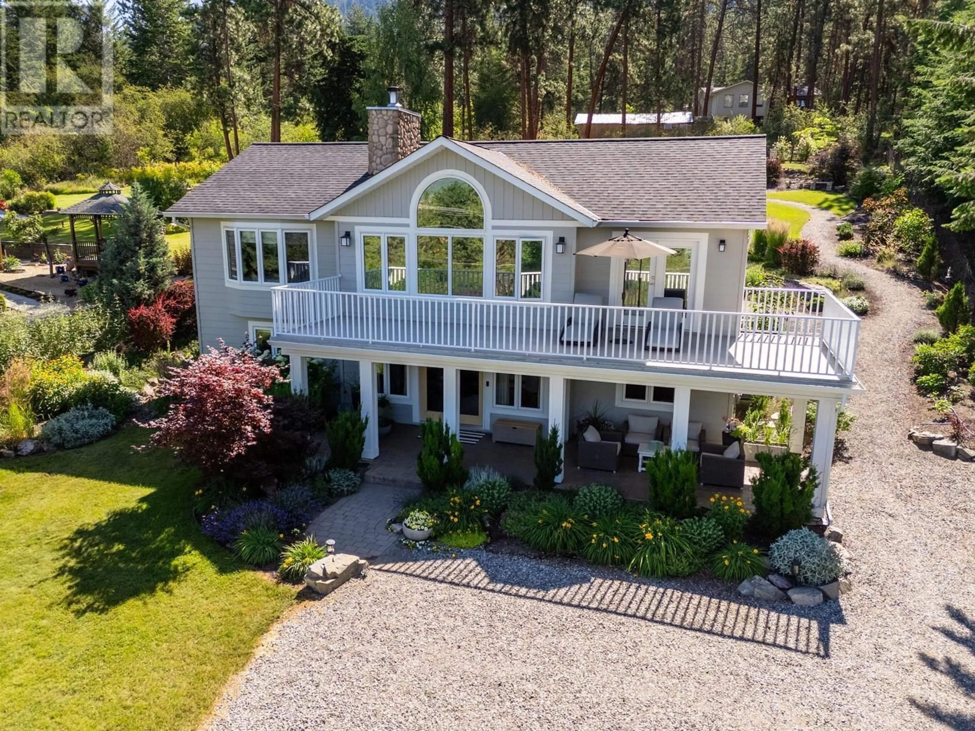 A pic from outside/outdoor area/front of a property/back of a property/a pic from drone, water/lake/river/ocean view for 16699 CARRS LANDING ROAD, Lake Country British Columbia V4V1B2