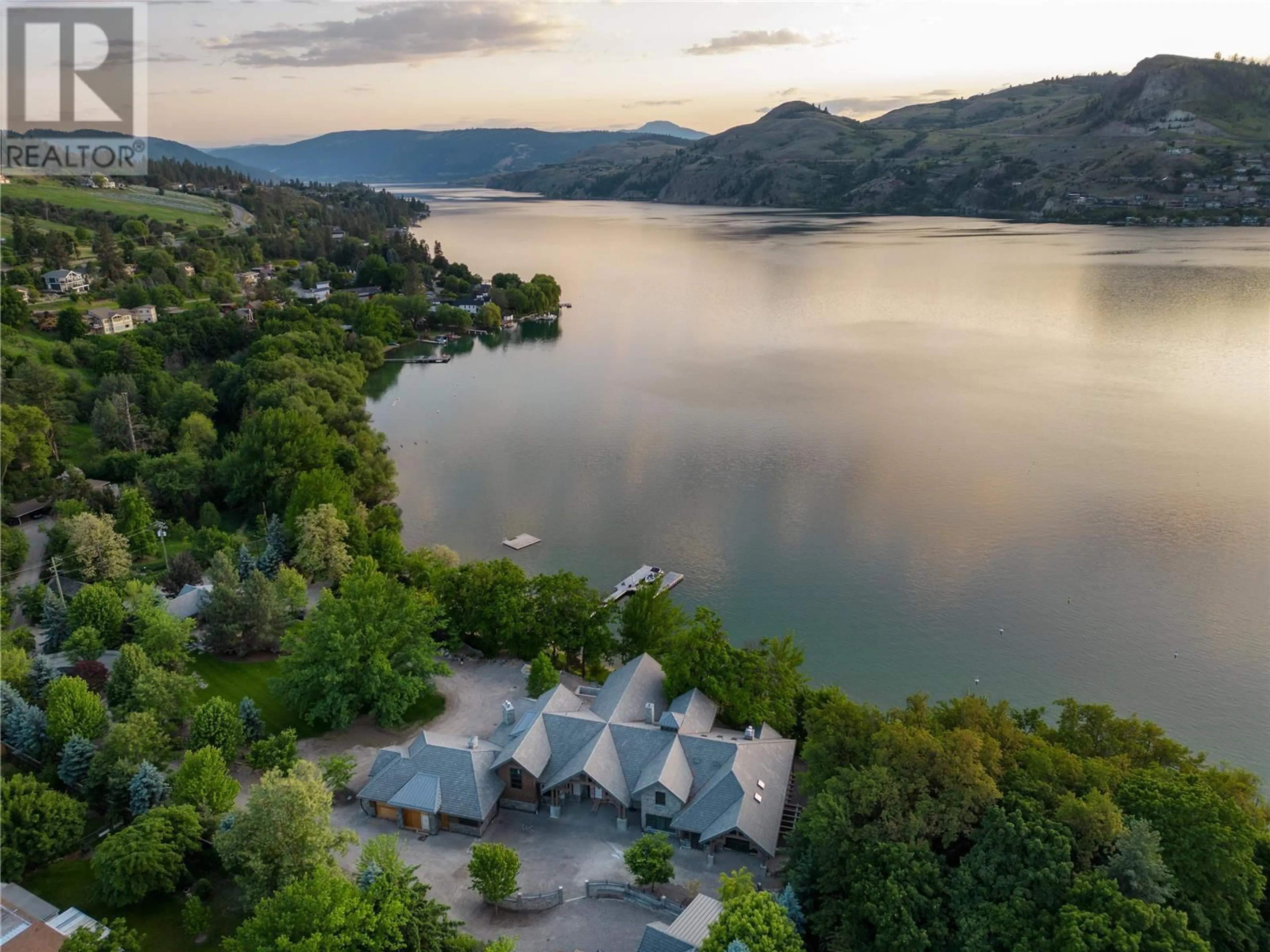 A pic from outside/outdoor area/front of a property/back of a property/a pic from drone, water/lake/river/ocean view for 12407 COLDSTREAM CREEK ROAD, Coldstream British Columbia V1B1G2