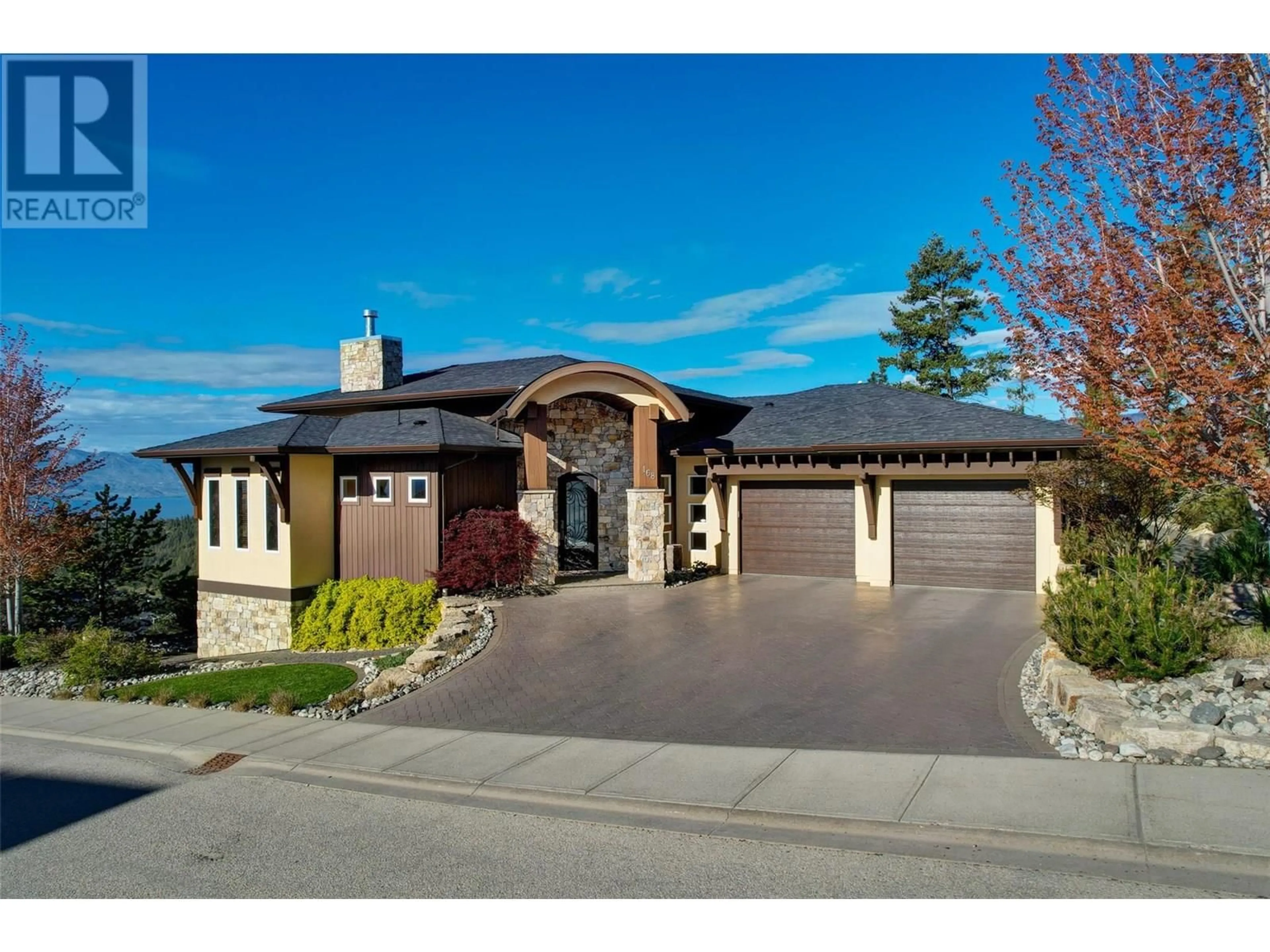 Home with brick exterior material, street for 168 SKYLAND DRIVE, Kelowna British Columbia V1V3A1