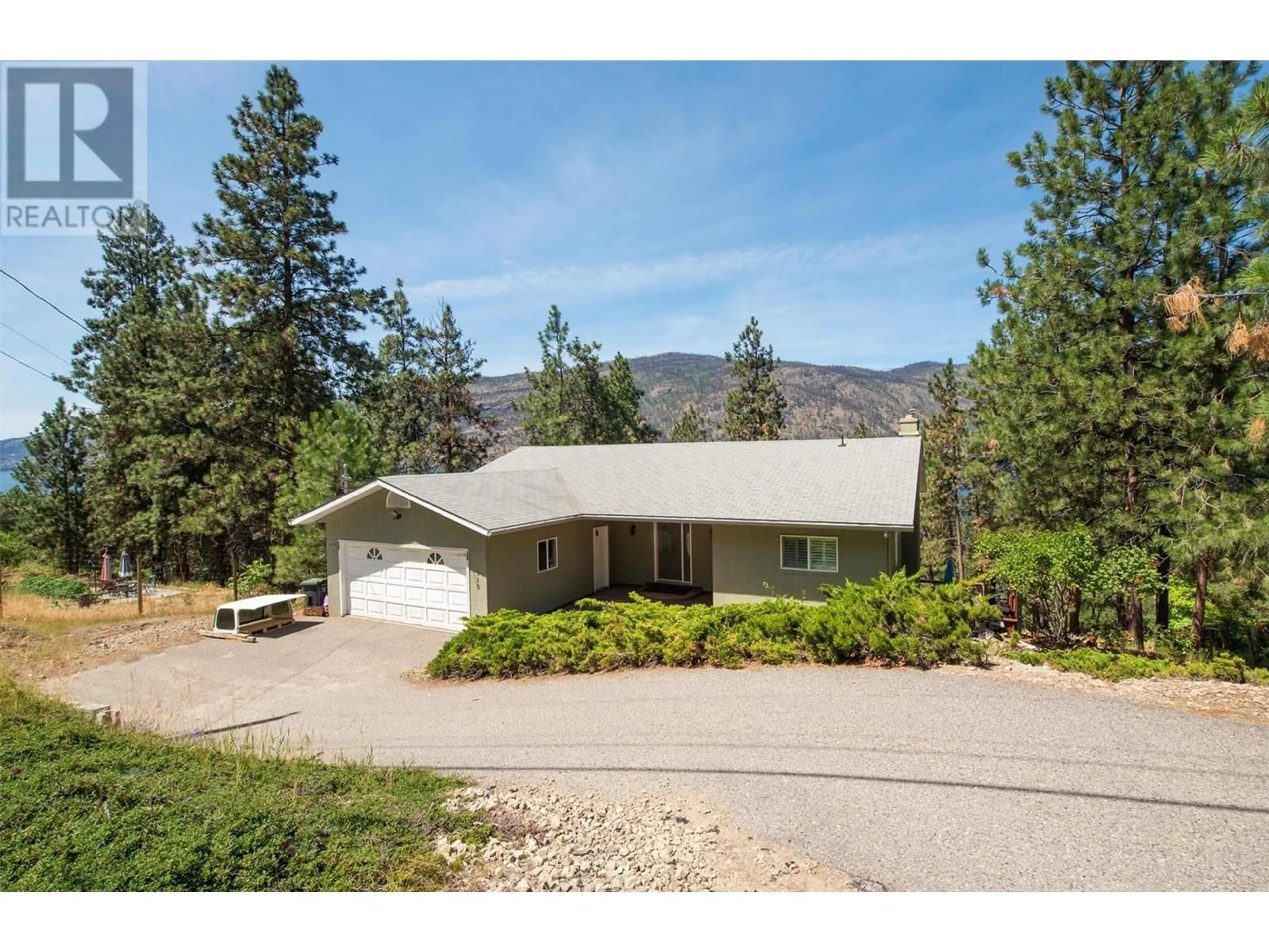 A pic from outside/outdoor area/front of a property/back of a property/a pic from drone, mountain view for 1310 MCKINLEY ROAD, Kelowna British Columbia V1V2B7