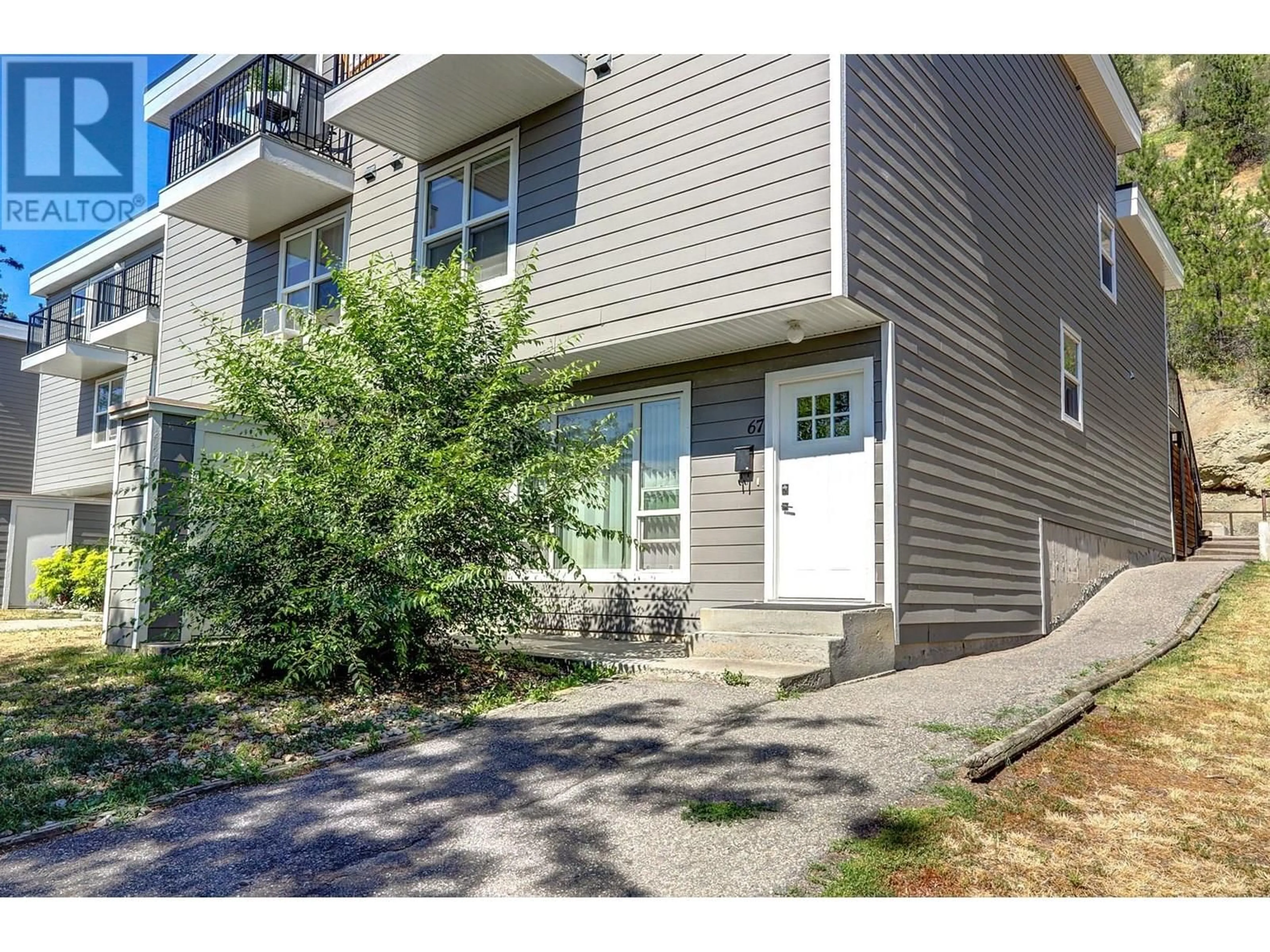 Home with vinyl exterior material, street for 67 - 3800 40 AVENUE, Vernon British Columbia V1T6S3