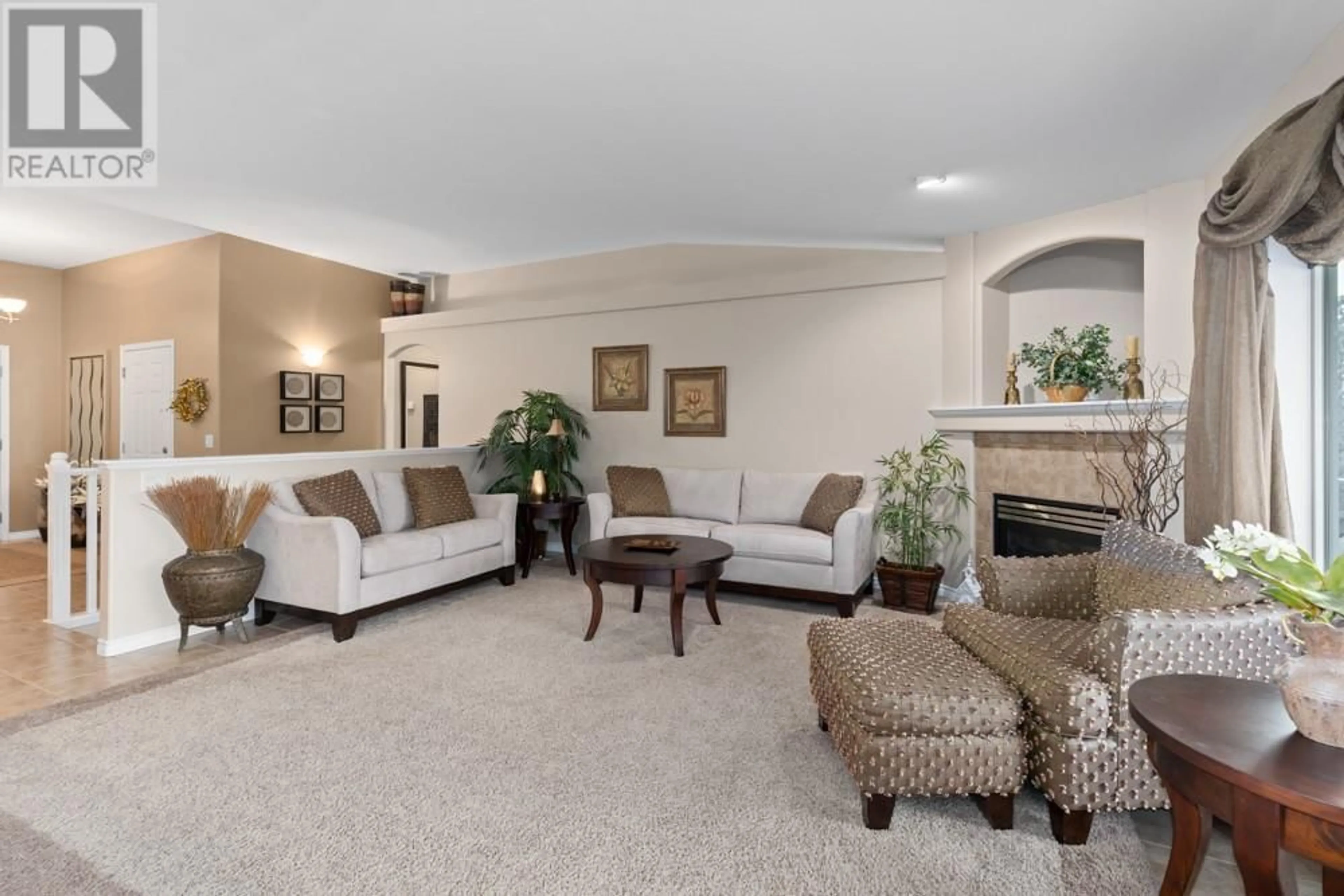 Living room with furniture, carpet floor for 21 - 3512 RIDGE BOULEVARD, West Kelowna British Columbia V4T2X5