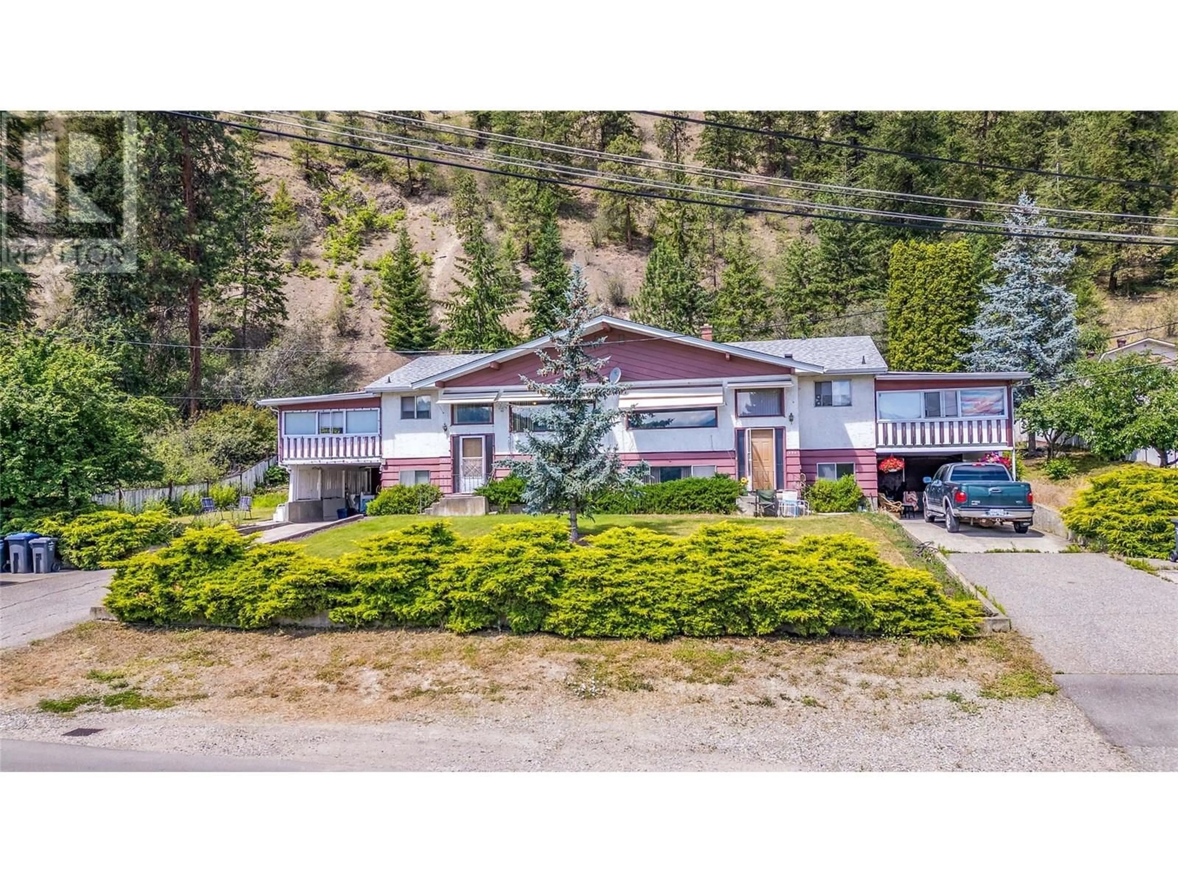 A pic from outside/outdoor area/front of a property/back of a property/a pic from drone, mountain view for 396 MOUBRAY ROAD, Kelowna British Columbia V1V1R4