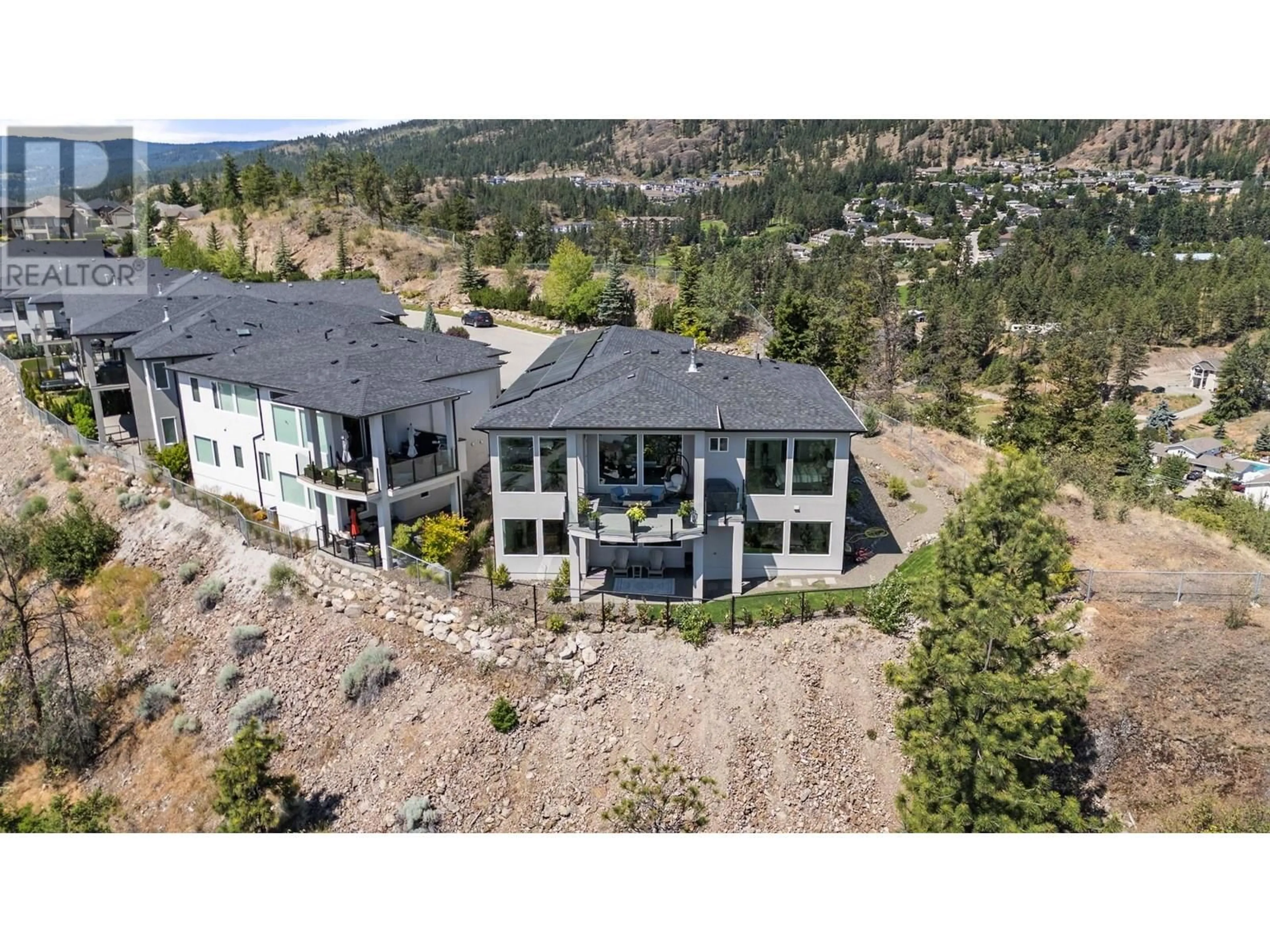 A pic from outside/outdoor area/front of a property/back of a property/a pic from drone, mountain view for 2502 HEDGESTONE DRIVE, West Kelowna British Columbia V4T2Y3