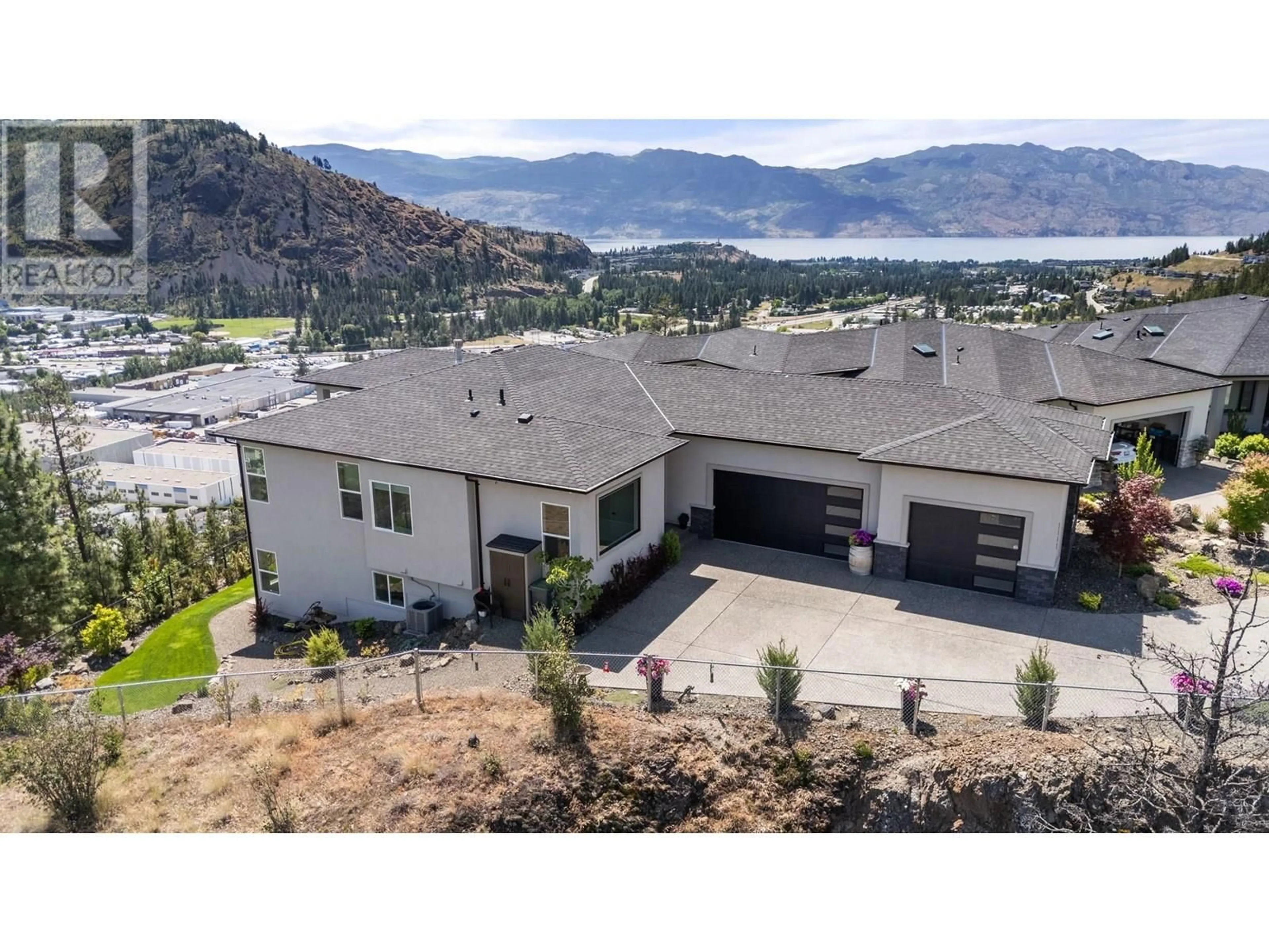 A pic from outside/outdoor area/front of a property/back of a property/a pic from drone, mountain view for 2502 HEDGESTONE DRIVE, West Kelowna British Columbia V4T2Y3