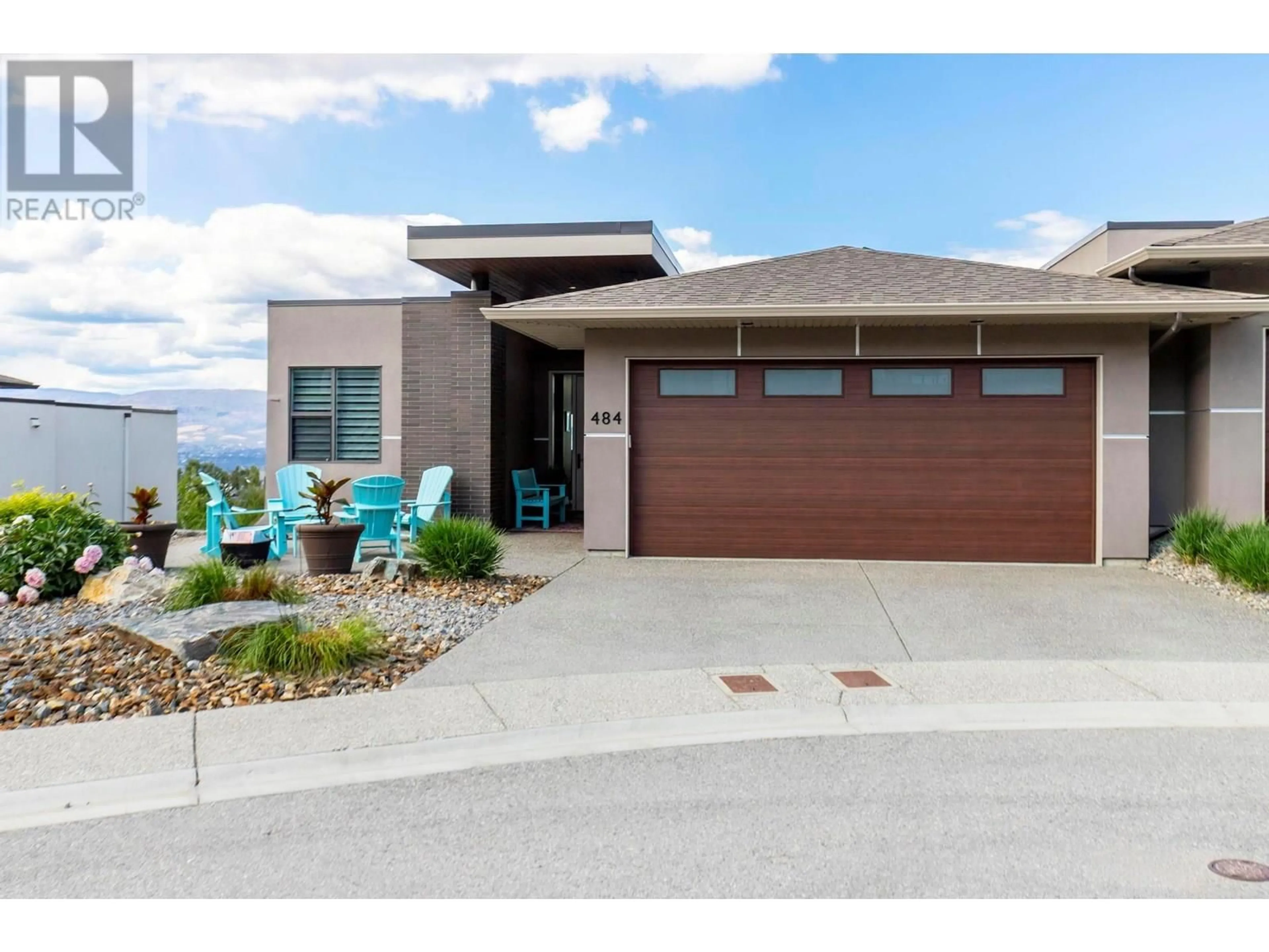 Home with brick exterior material, street for 484 SPARROW HAWK COURT, Kelowna British Columbia V1W0A6