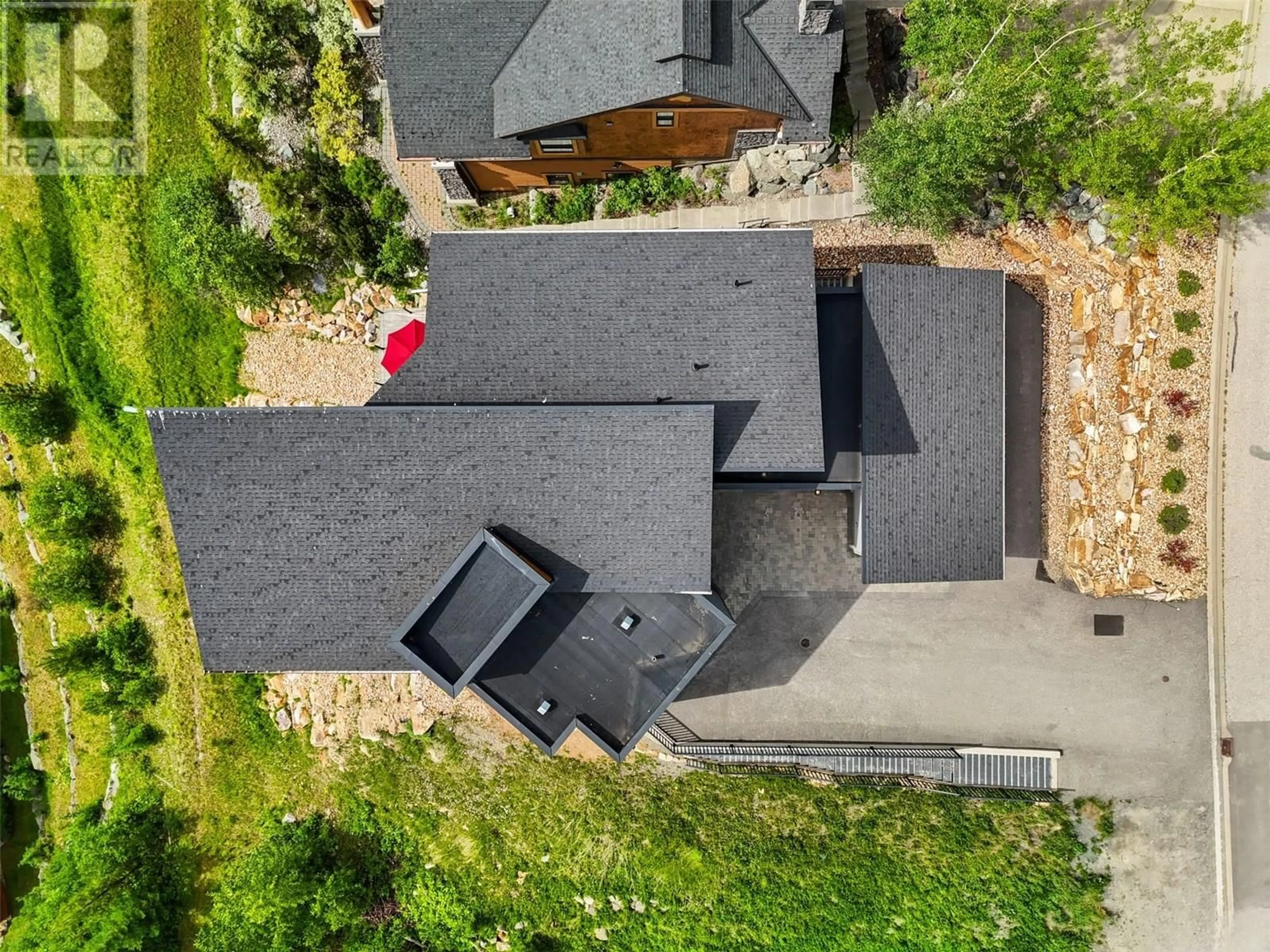 A pic from outside/outdoor area/front of a property/back of a property/a pic from drone, street for 4249 BELLA VISTA DRIVE, Sun Peaks British Columbia V0E5N0