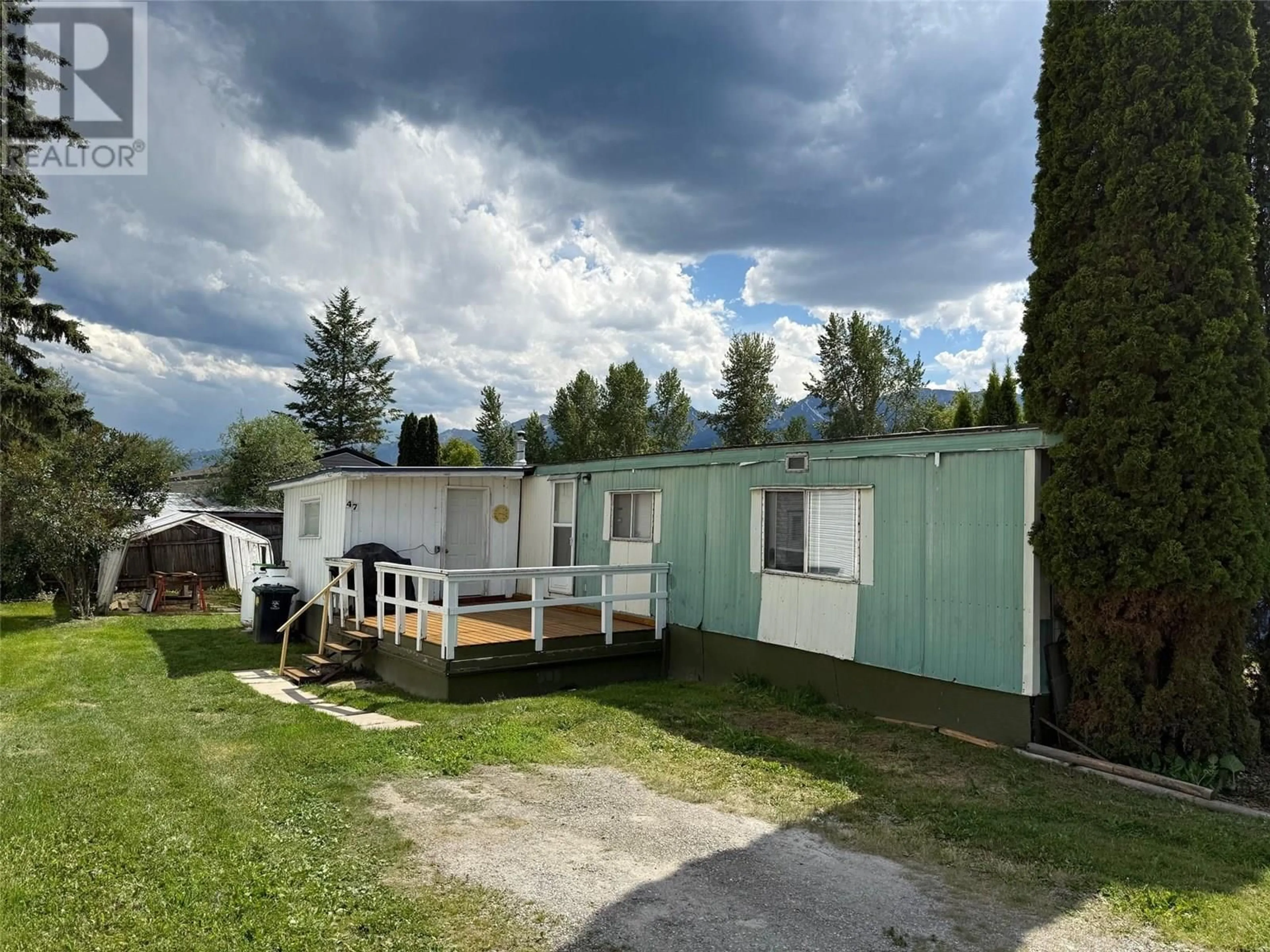 A pic from outside/outdoor area/front of a property/back of a property/a pic from drone, unknown for 47 - 1040 9TH AVENUE, Golden British Columbia V0A1H2